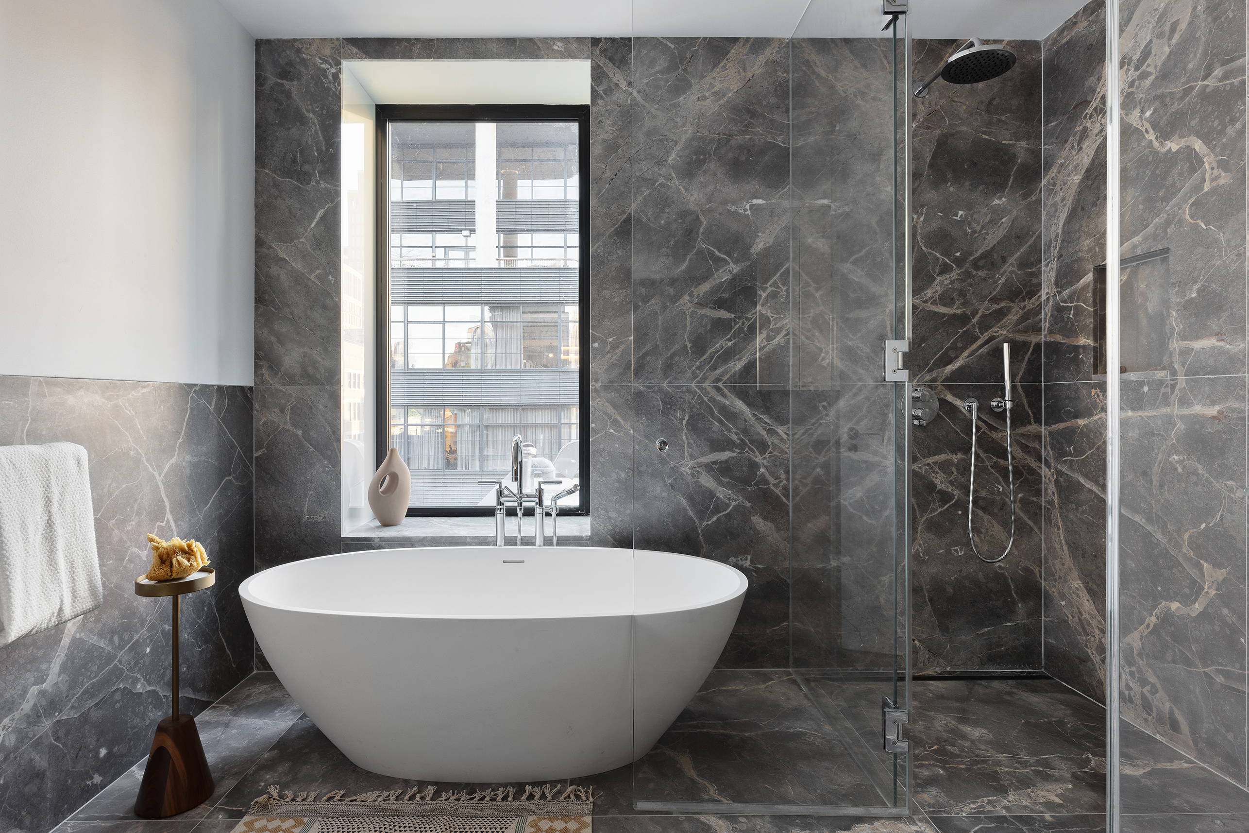 500 West 22nd Street, Unit PHW Manhattan, NY 10011 - Photo 19 of 28 a bathroom with a bathtub and shower