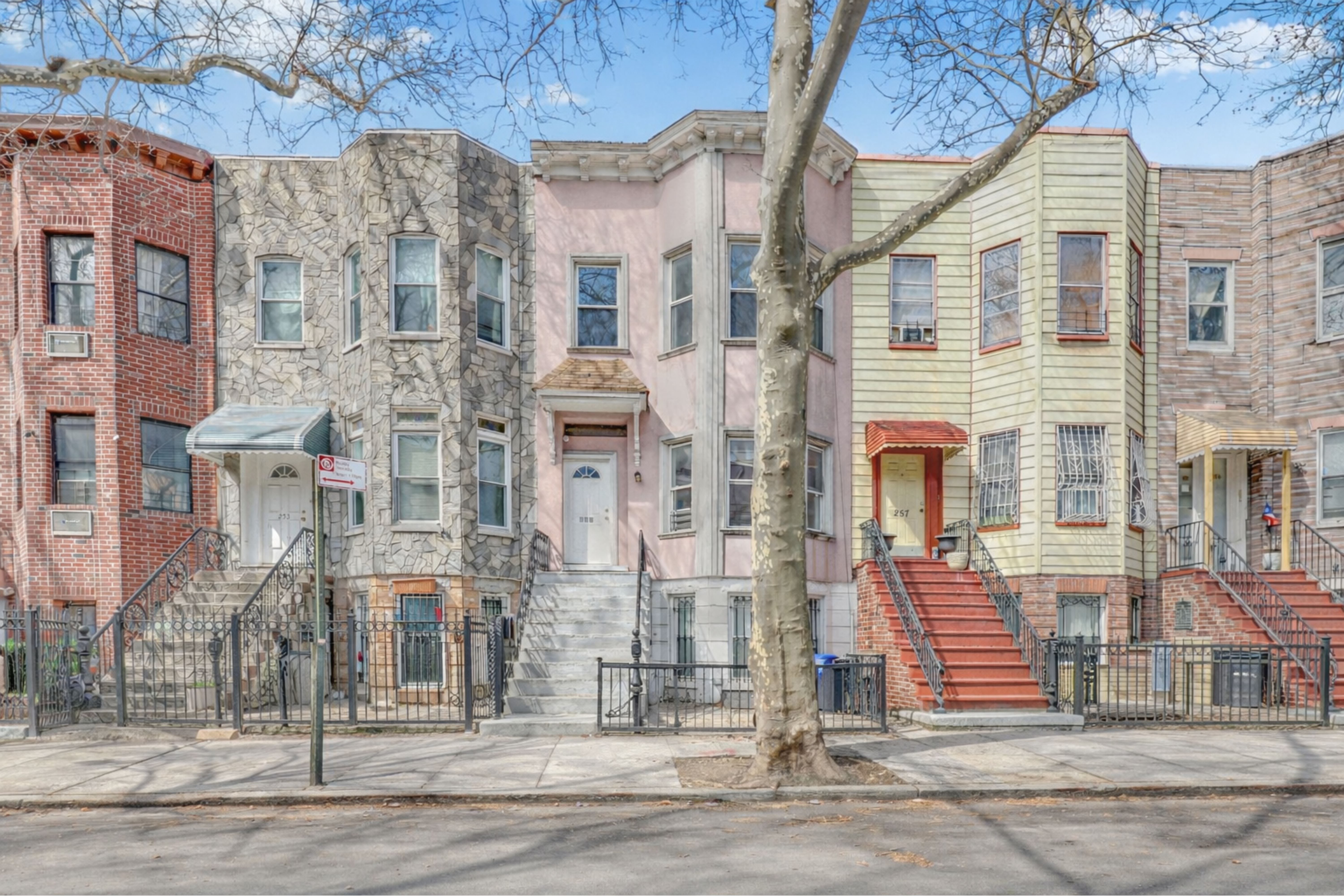 255 Covert Street Brooklyn, NY 11207 - Photo 17 of 18 a front view of a multi story residential apartment building