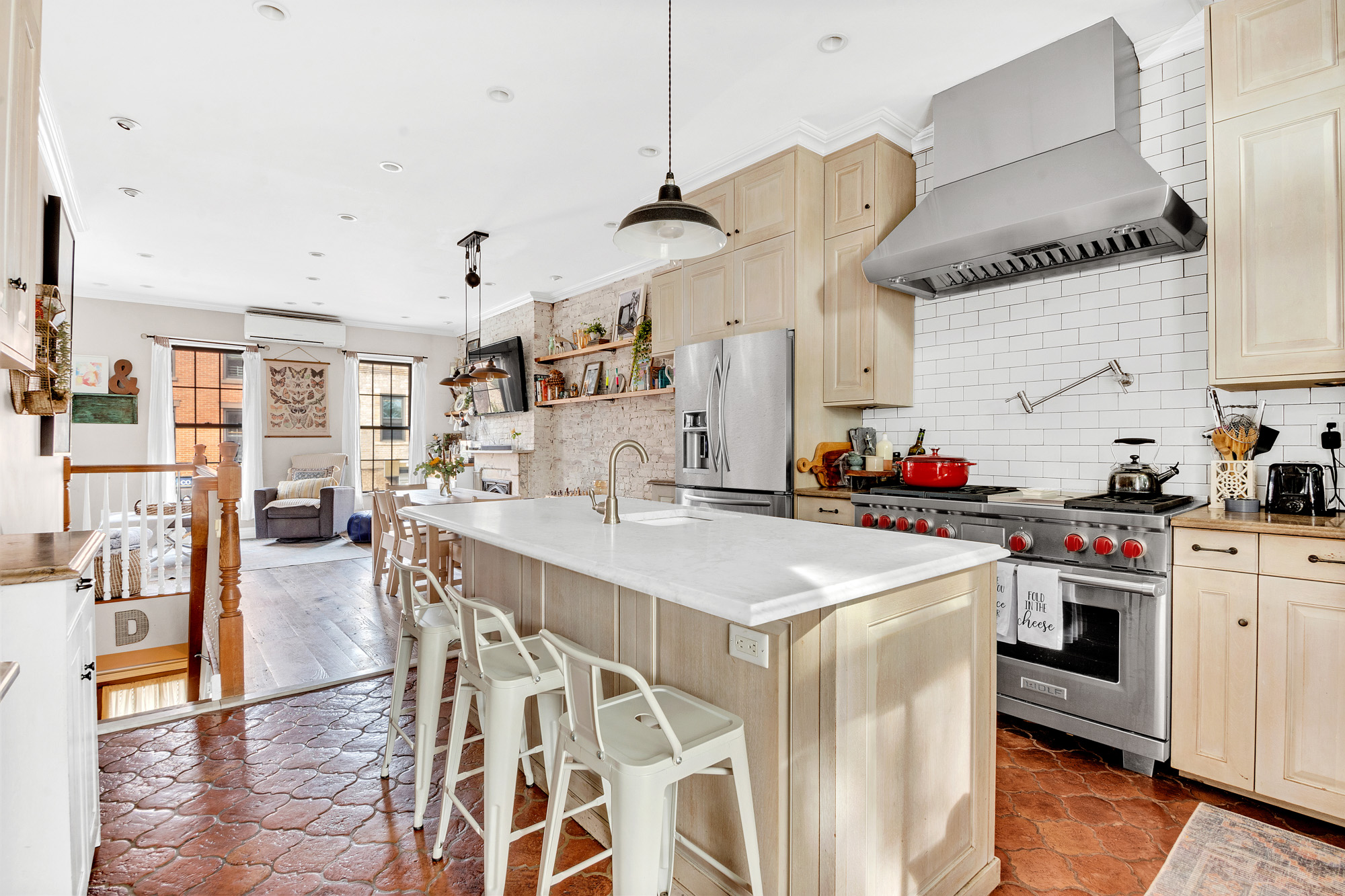 10 Carroll Street Brooklyn, NY 11231 - Photo 7 of 28 a kitchen with stainless steel appliances granite countertop a sink a stove and a refrigerator