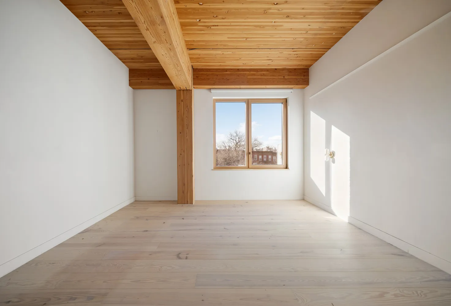 a bathroom with a tub a sink and a shower