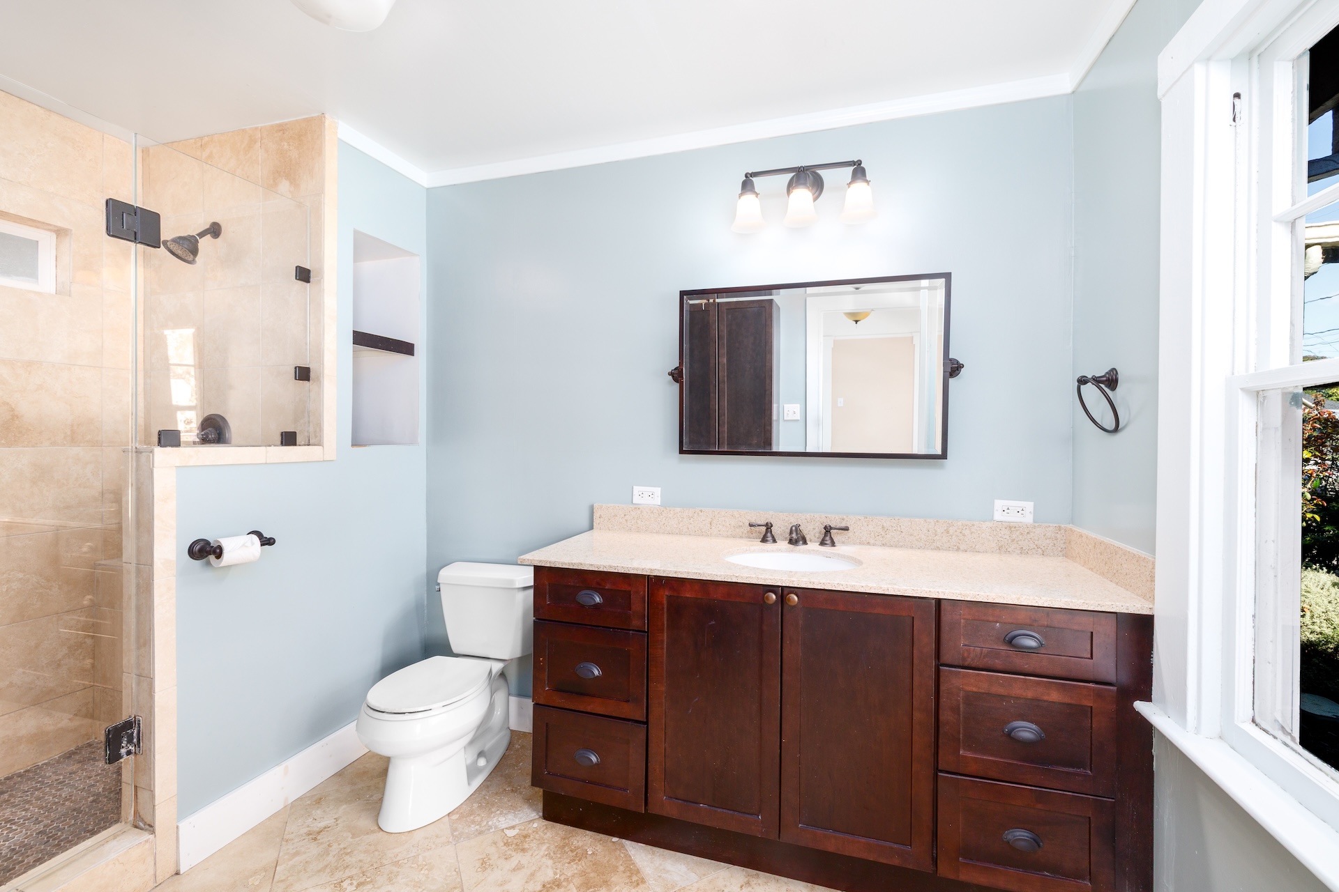 1203 Glenn Street Santa Rosa, CA 95401 - Photo 22 of 26 a bathroom with a toilet sink and mirror