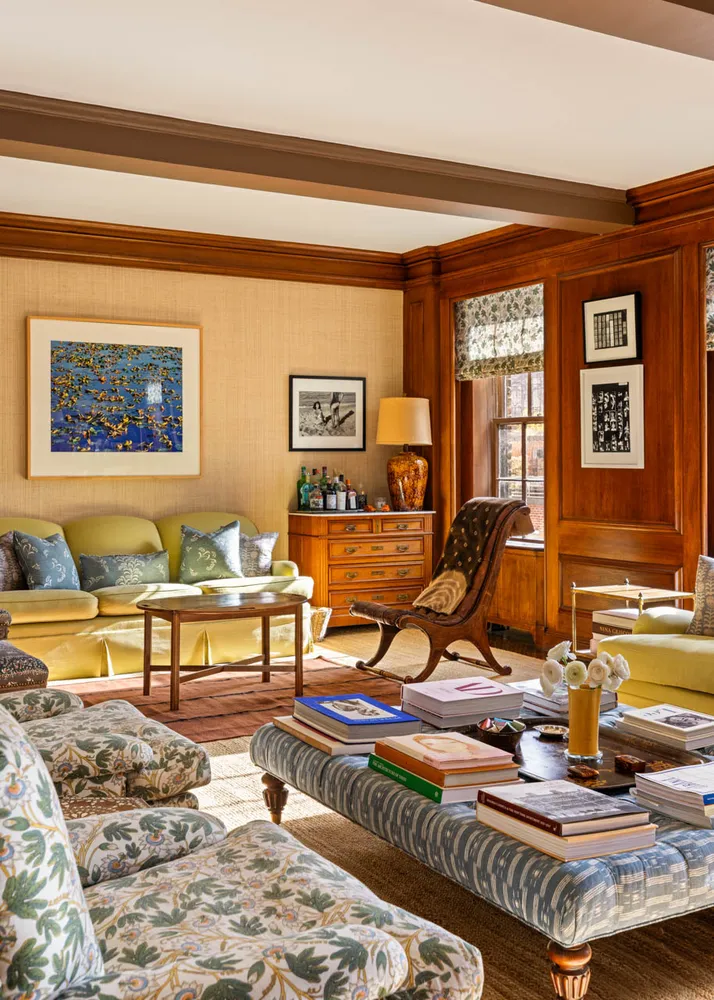 a living room with furniture pool and a table