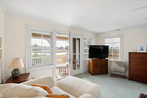 a bathroom with a sink and a window