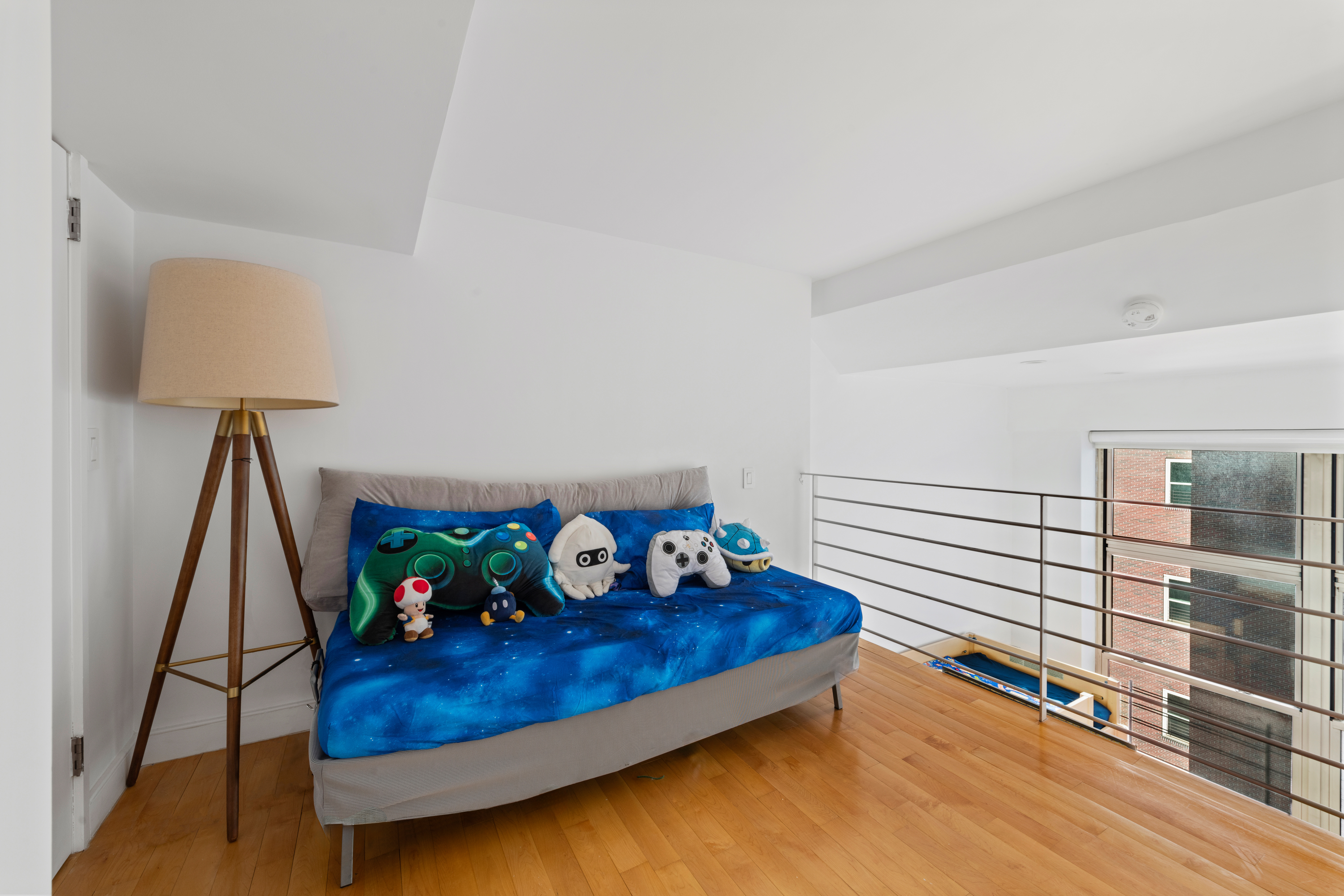 120 East 87th Street, Unit R16G Manhattan, NY 10128 - Photo 11 of 20 a bedroom with furniture and a wooden floor