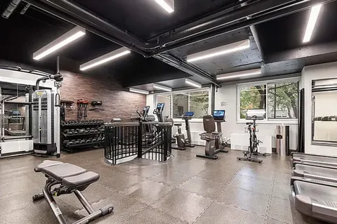 a view of a room with gym equipment