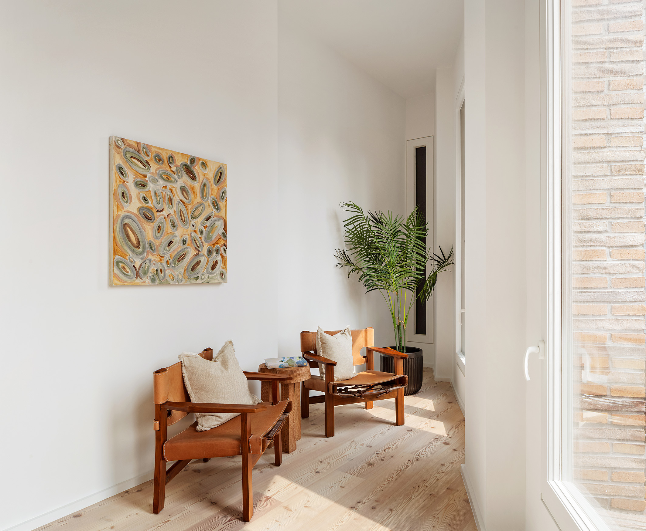1 Avenue Of The Americas, Unit 5N Manhattan, NY 10013 - Photo 8 of 17 a living room with furniture and a potted plant
