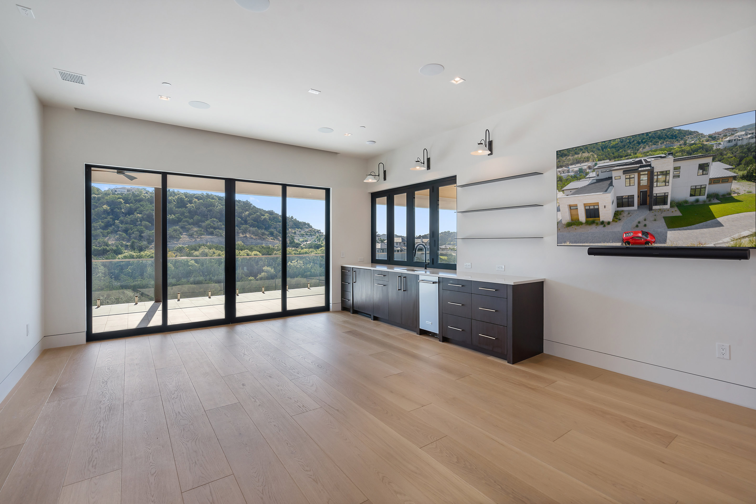 1905 Hallam Drive Austin, TX 78746 - Photo 17 of 39 a view of kitchen with furniture and wooden floor