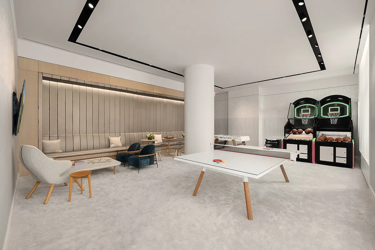 430 East 58th Street, Unit 38A Manhattan, NY 10022 - Photo 16 of 22 a living room with furniture and a rug