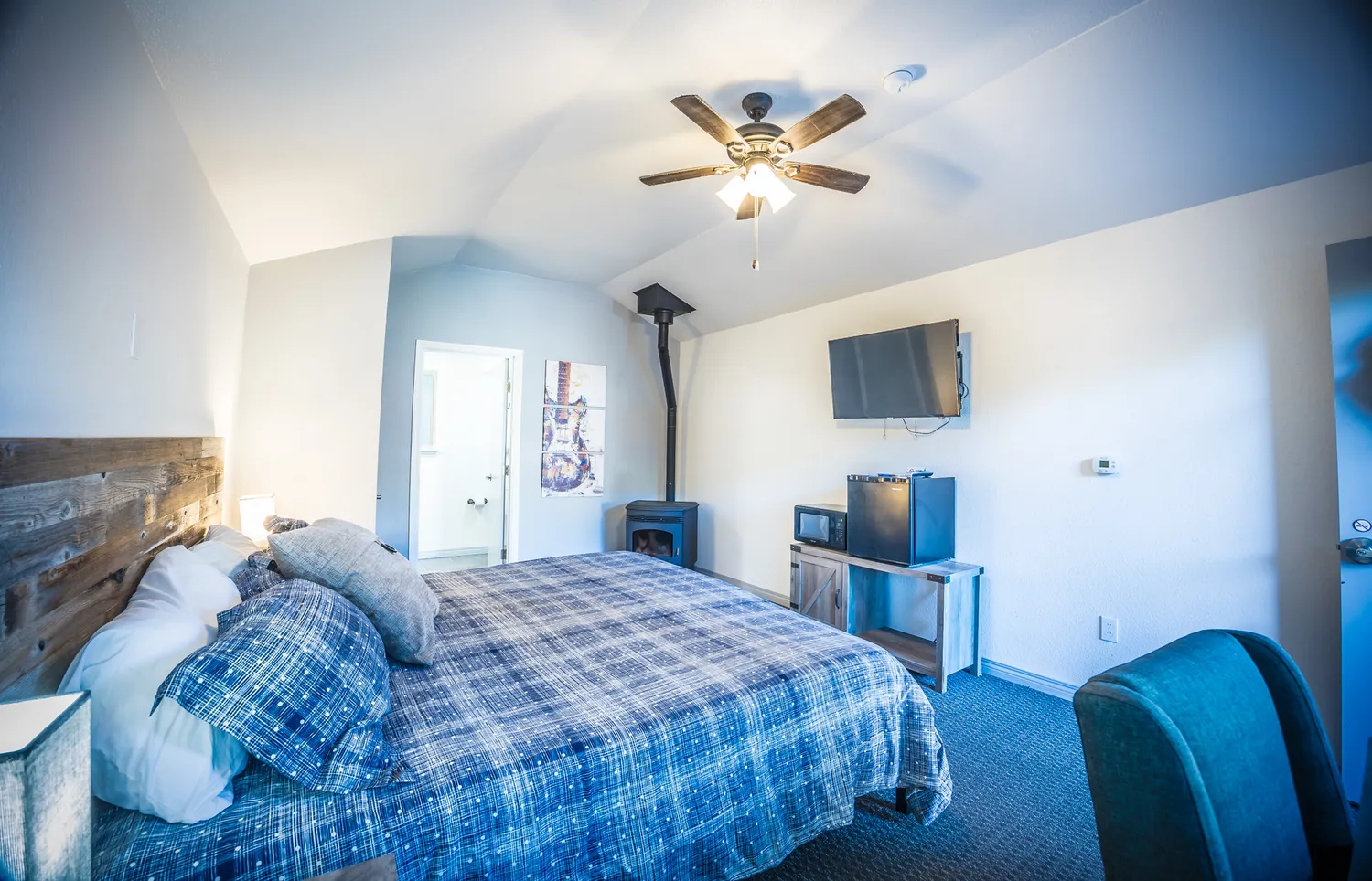 a kitchen with lots of appliances and cabinets