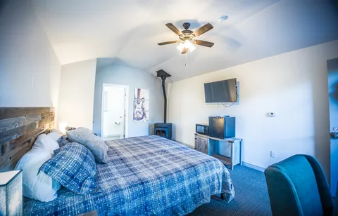 a kitchen with lots of appliances and cabinets