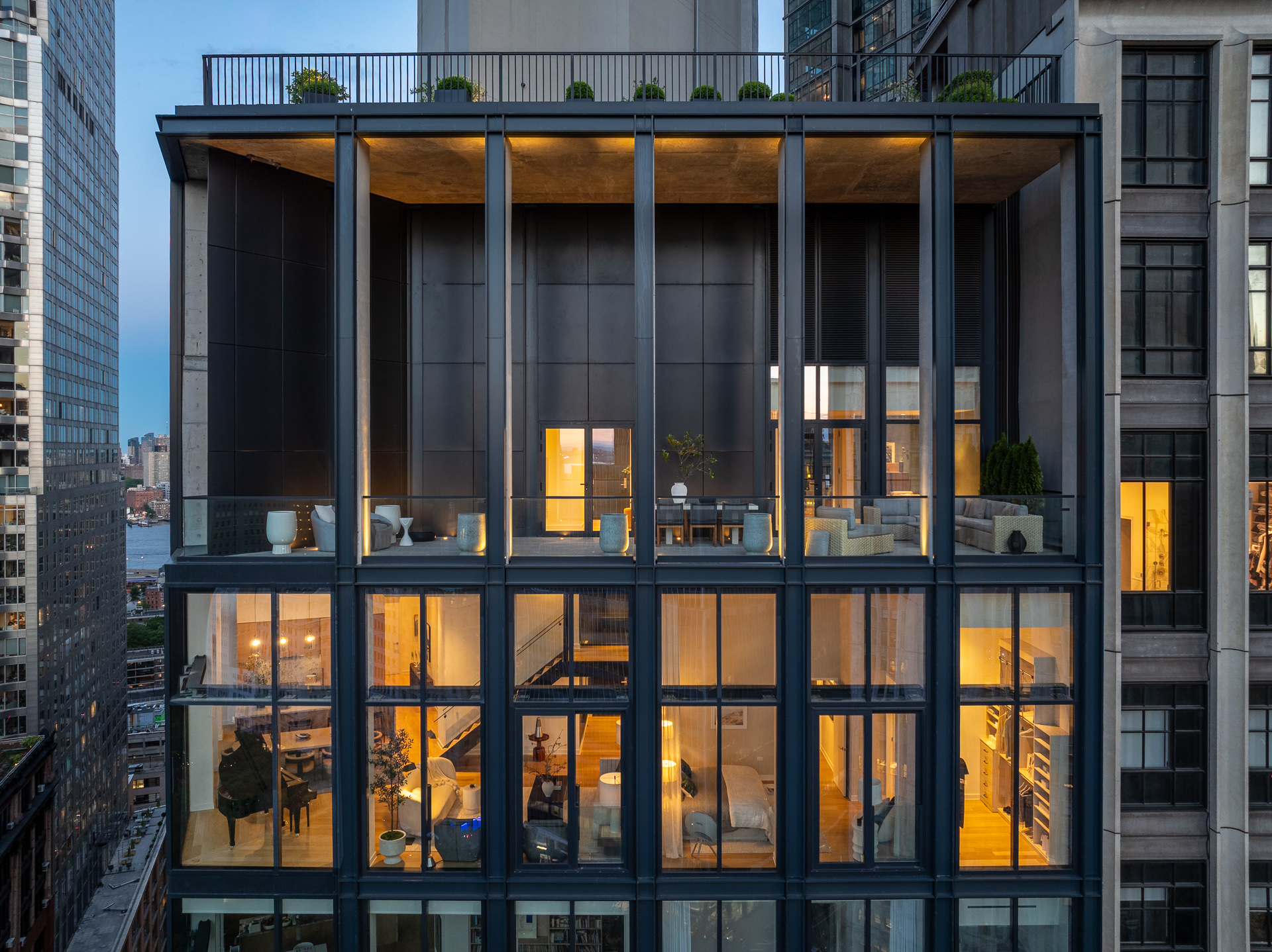 33 Park Row, Unit PH1 Manhattan, NY 10038 - Photo 7 of 15 a front view of a house with glass windows