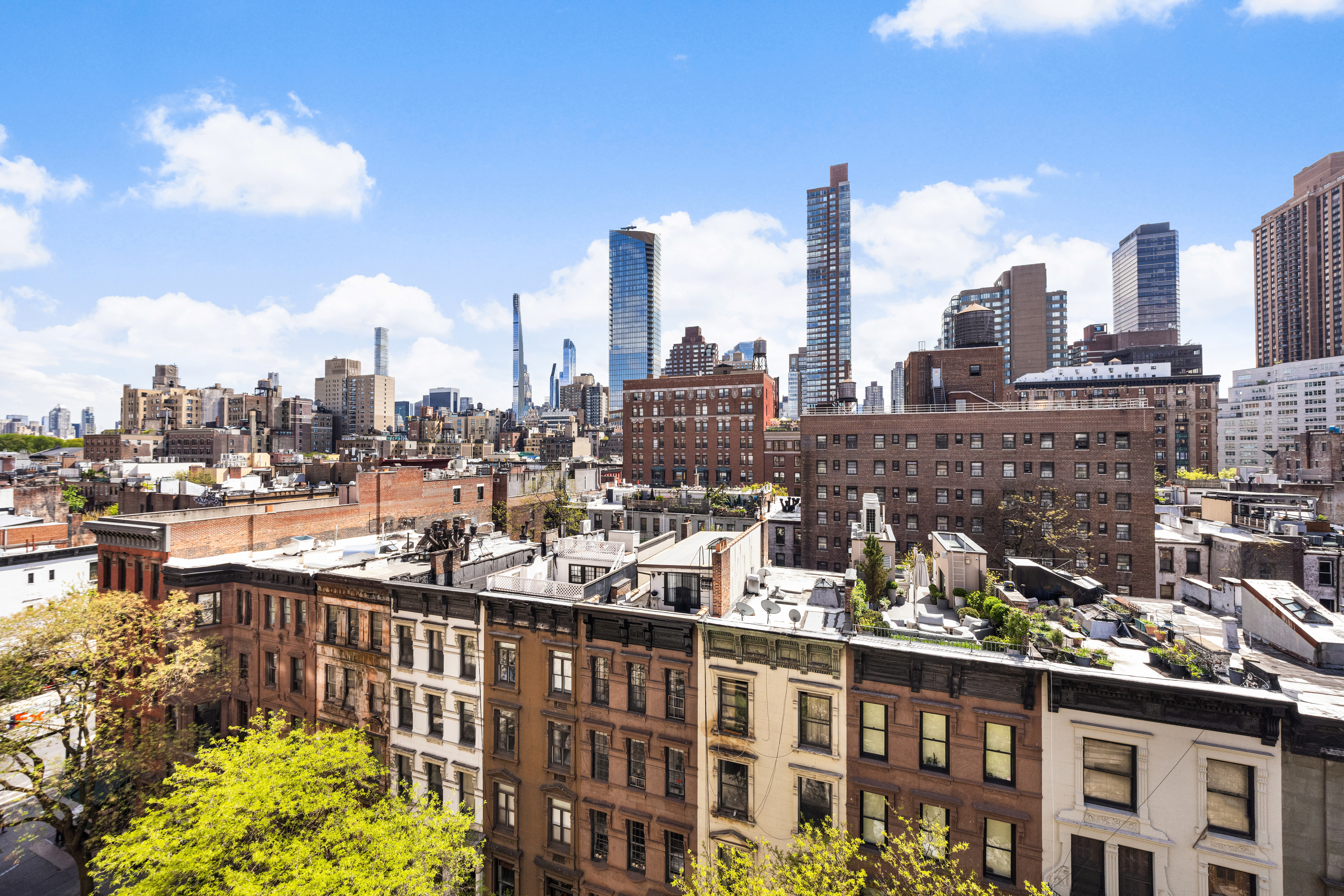 119 West 71st Street, Unit 9B Manhattan, NY 10023 - Photo 9 of 18 a view of a city with tall buildings