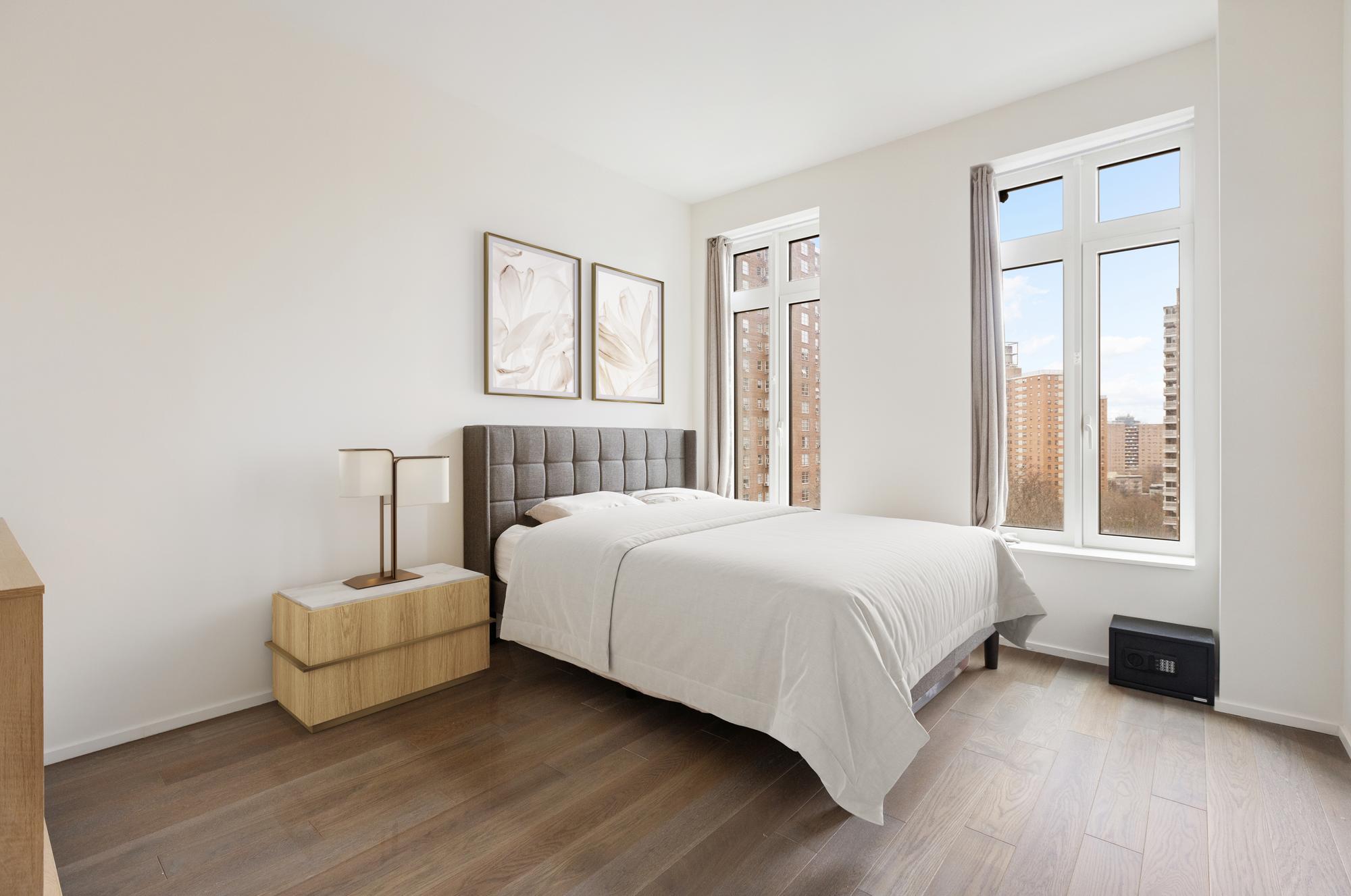 543 West 122nd Street, Unit 6B Manhattan, NY 10027 - Photo 6 of 18 a spacious bedroom with a bed and a couch