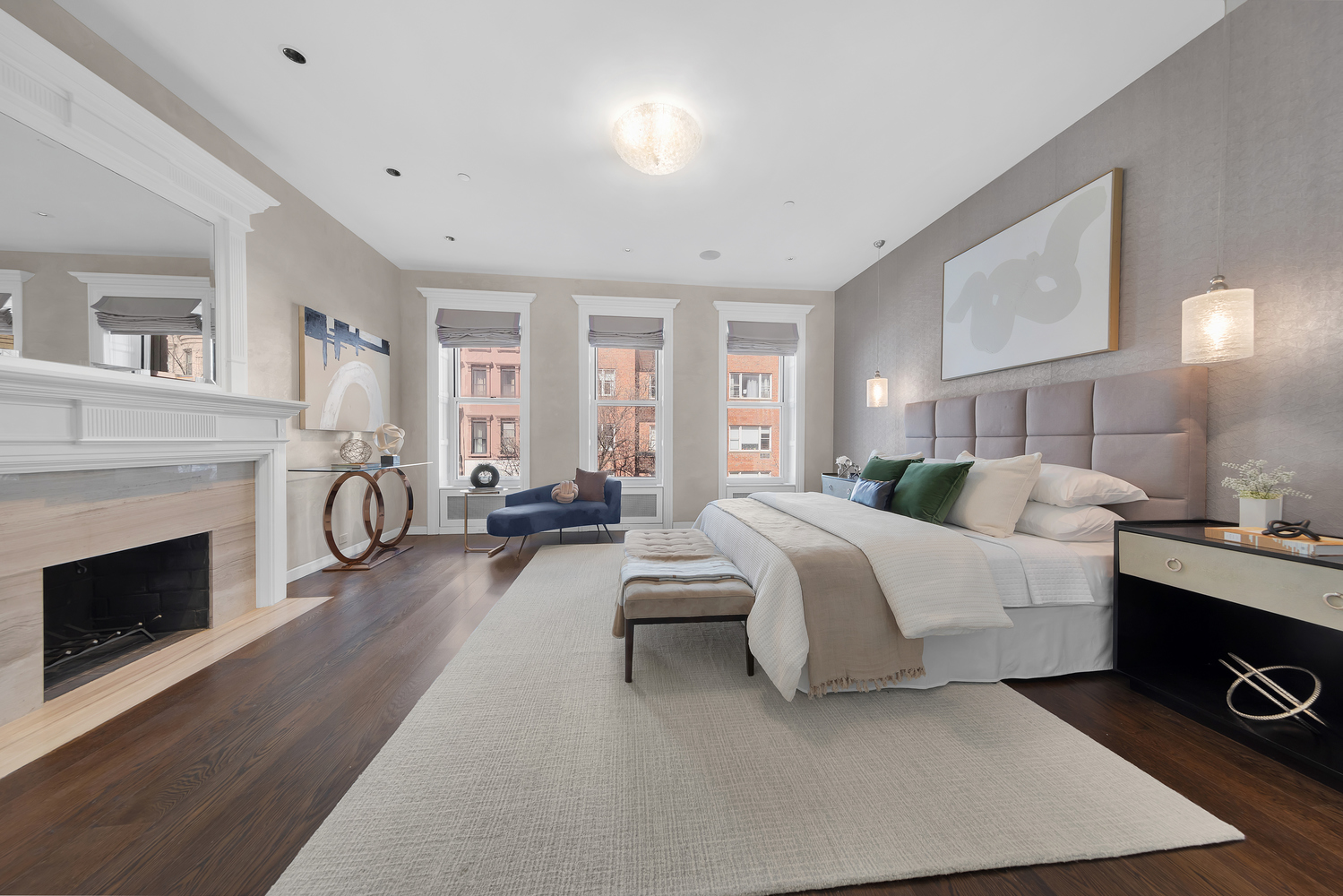 42 West 71st Street Manhattan, NY 10023 - Photo 15 of 35 a spacious bedroom with a bed and a fireplace