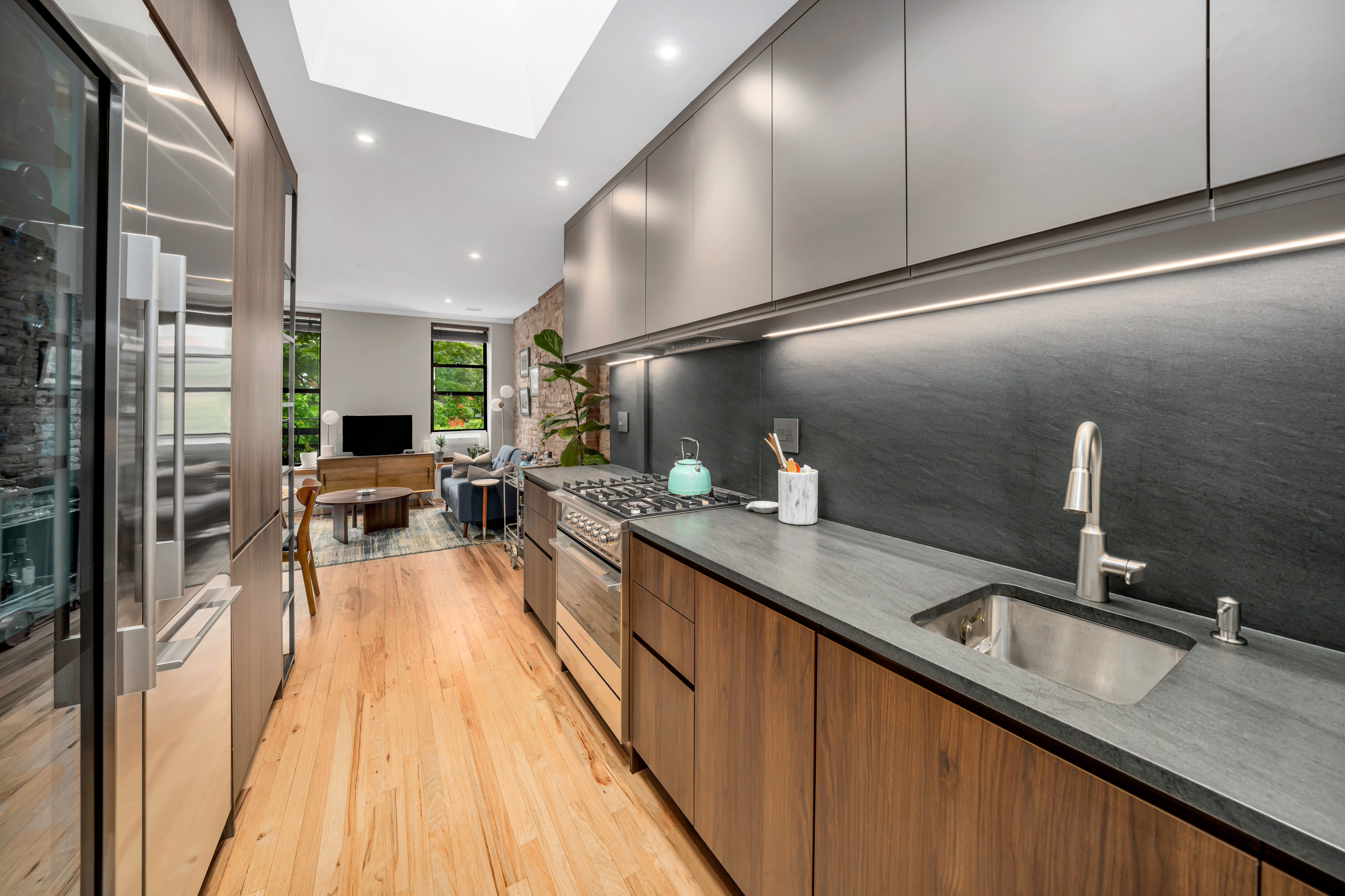 535 Clinton Street, Unit 4A Brooklyn, NY 11231 - Photo 5 of 10 a kitchen with counter top space a sink and stainless steel appliances