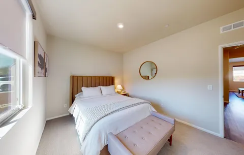 a bathroom with a toilet sink and shower