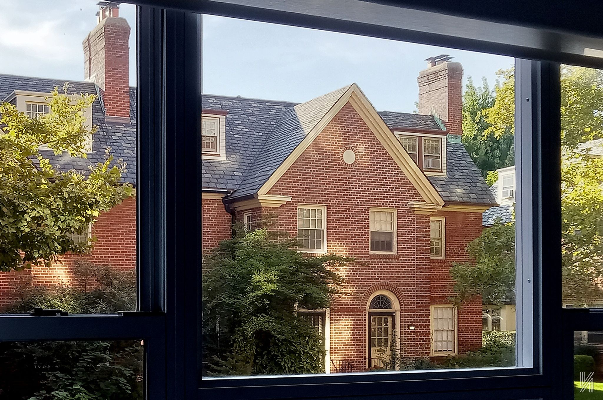 34-41 85th Street, Unit 1X Queens, NY 11372 - Photo 15 of 24 a view of a brick house with a large window