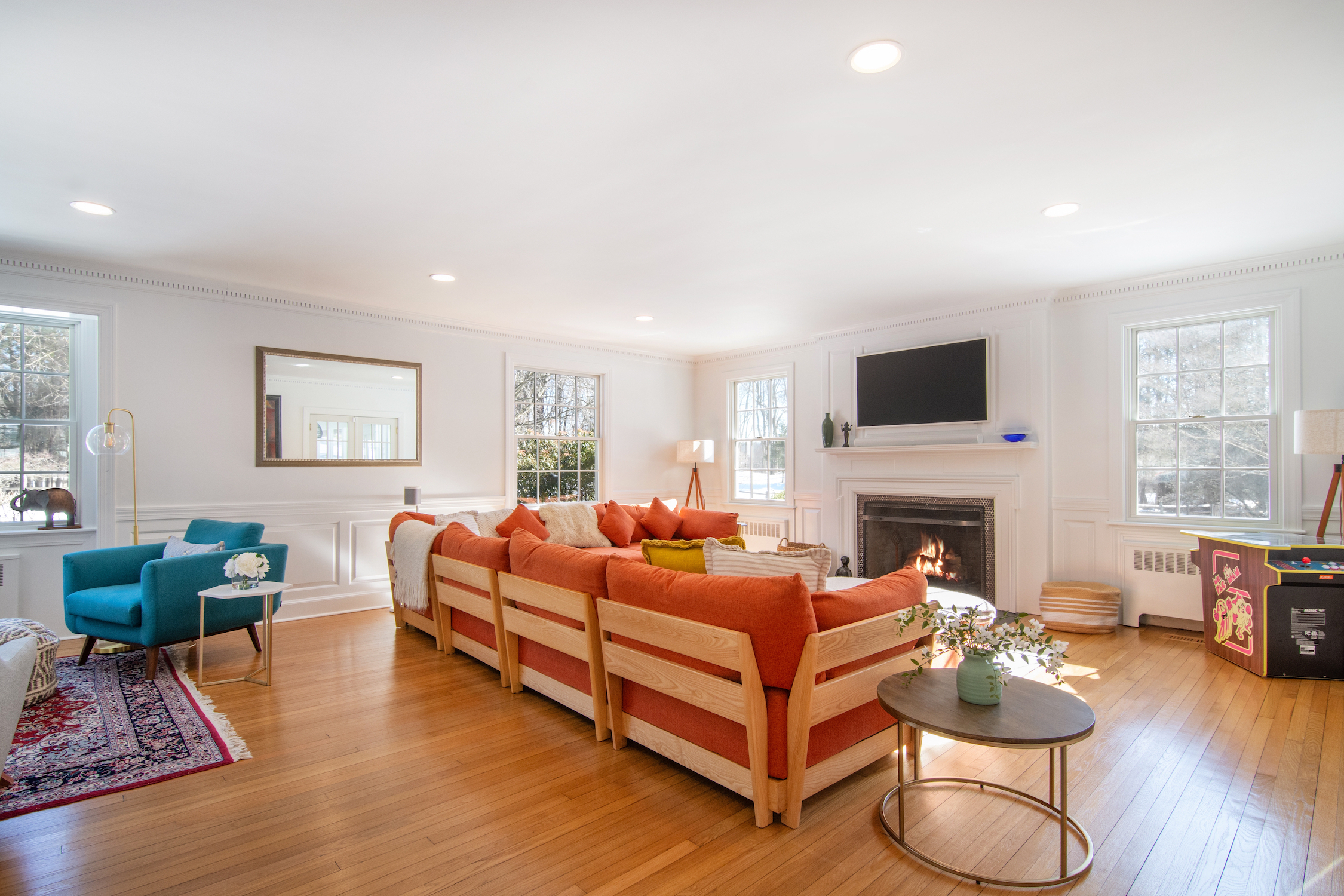 41 Harris Road Katonah, NY 10536 - Photo 12 of 48 a living room with furniture a fireplace and a window