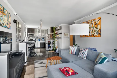 a living room with furniture and a couch