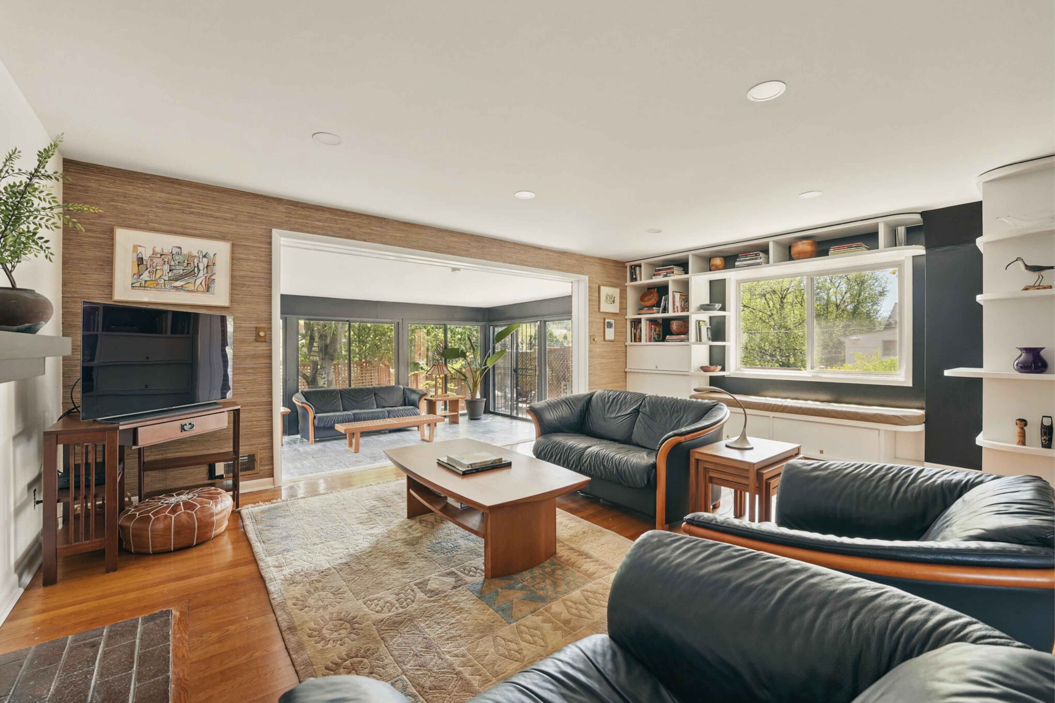 8003 16th Street Northwest Washington, DC 20012 - Photo 23 of 38 a living room with furniture and a flat screen tv