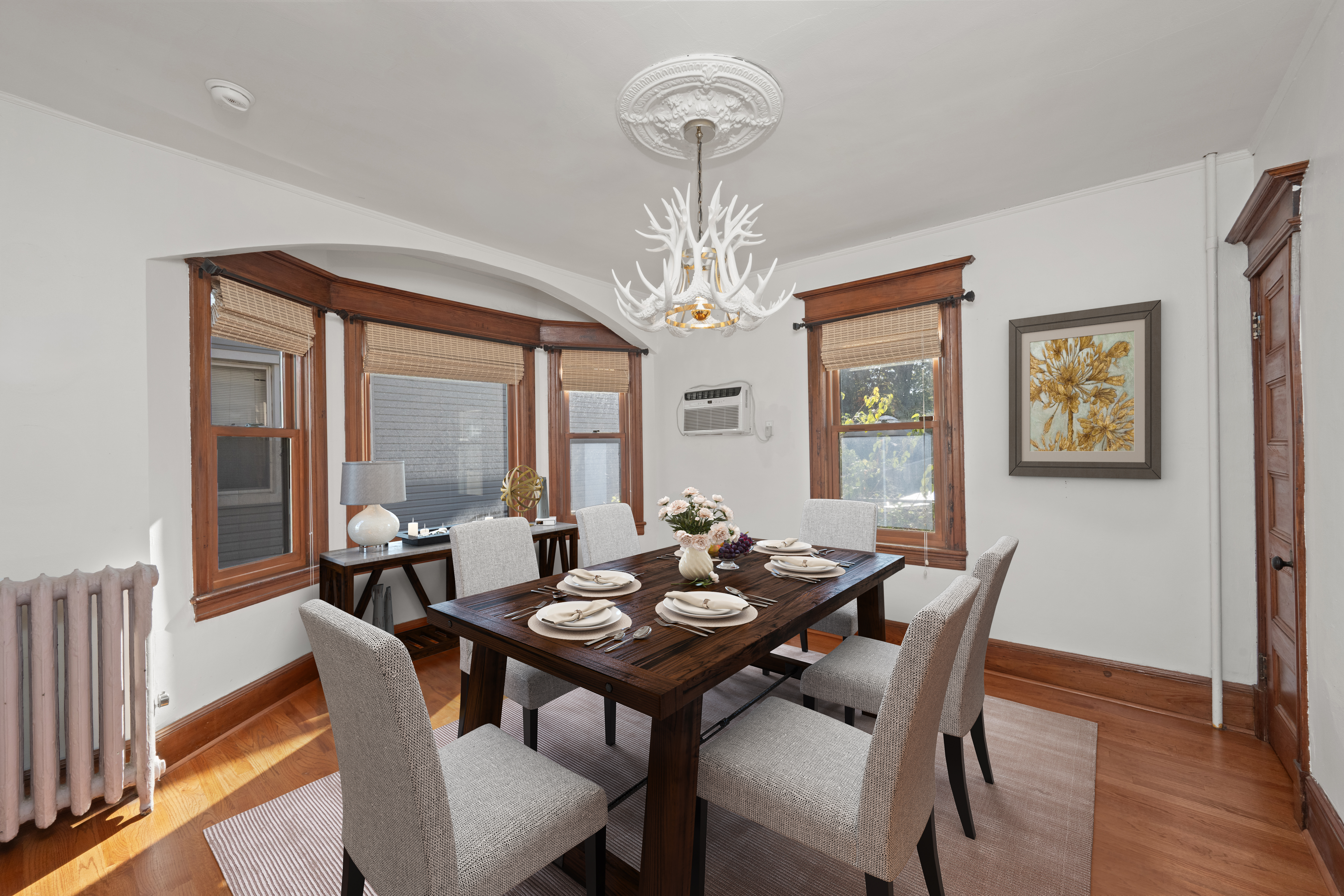 704 Delafield Avenue Staten Island, NY 10310 - Photo 10 of 35 a view of a dining room with furniture window and wooden floor