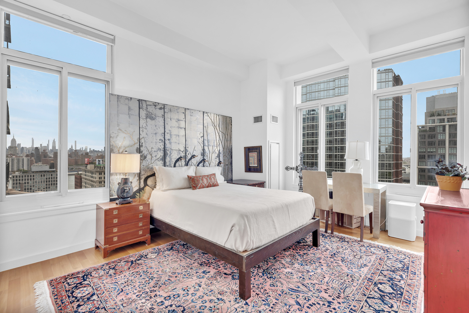 85 Adams Street, Unit 15D Brooklyn, NY 11201 - Photo 3 of 8 a living room with a large bed and a large window