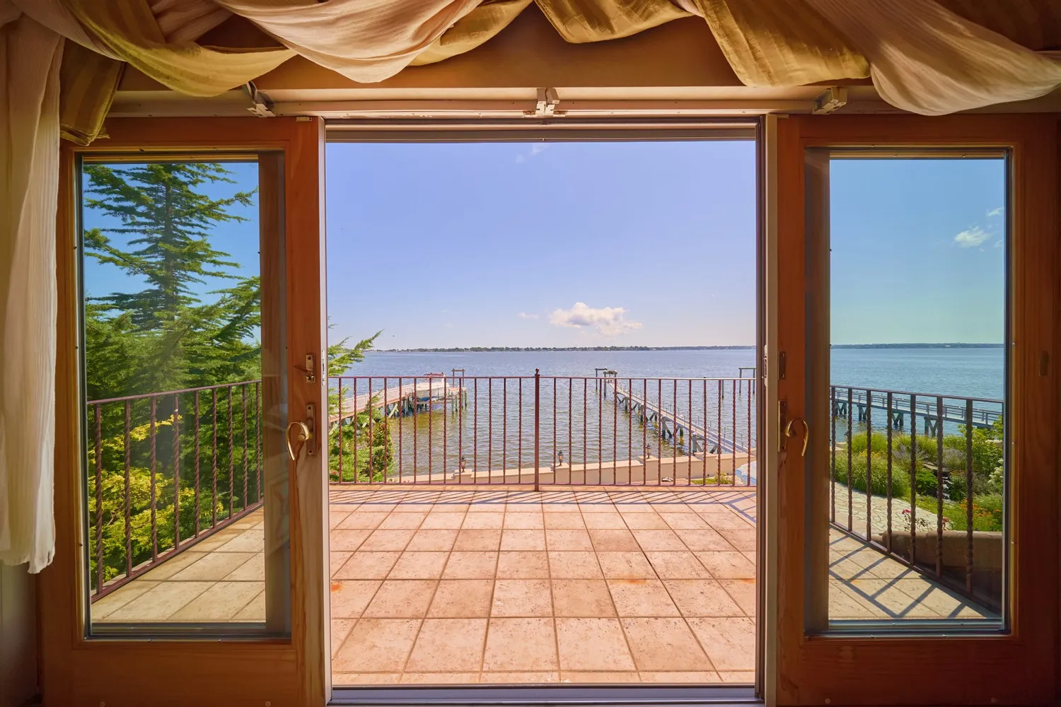 a view of a balcony with an outdoor space