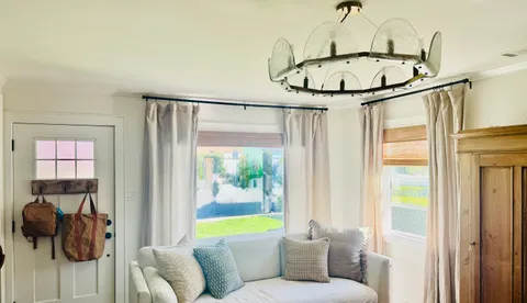 a view of a living room and a window