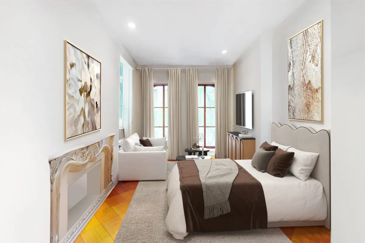 a bedroom with a bed and a large window