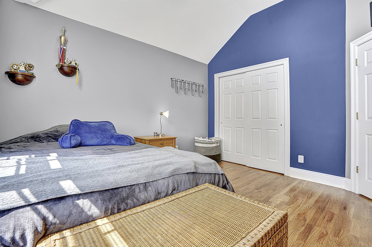 266 Feronia Way Rutherford, NJ 07070 - Photo 30 of 41 a bedroom with a bed and lamp