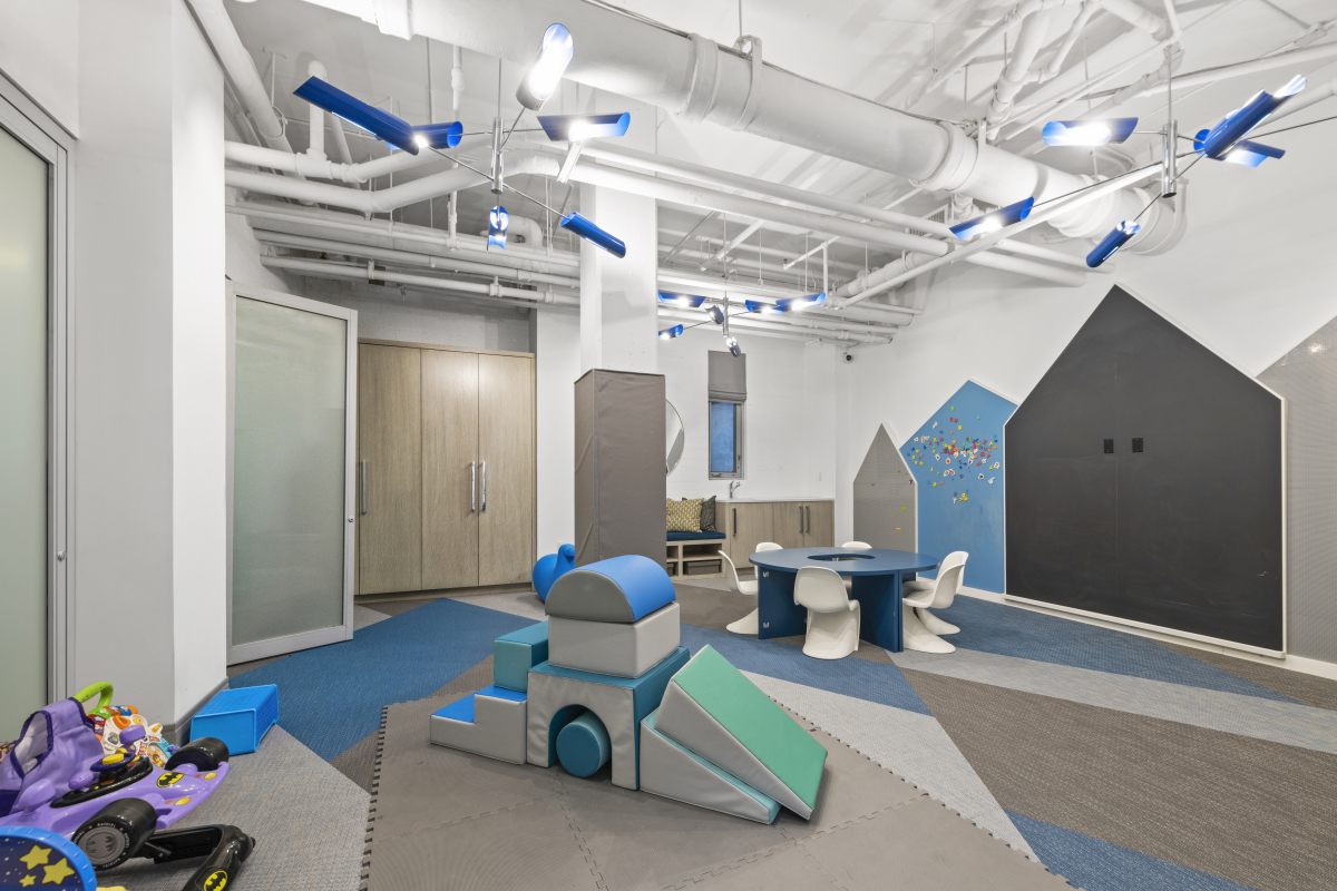 2 5th Avenue, Unit 2U Manhattan, NY 10011 - Photo 11 of 13 a living room filled with furniture