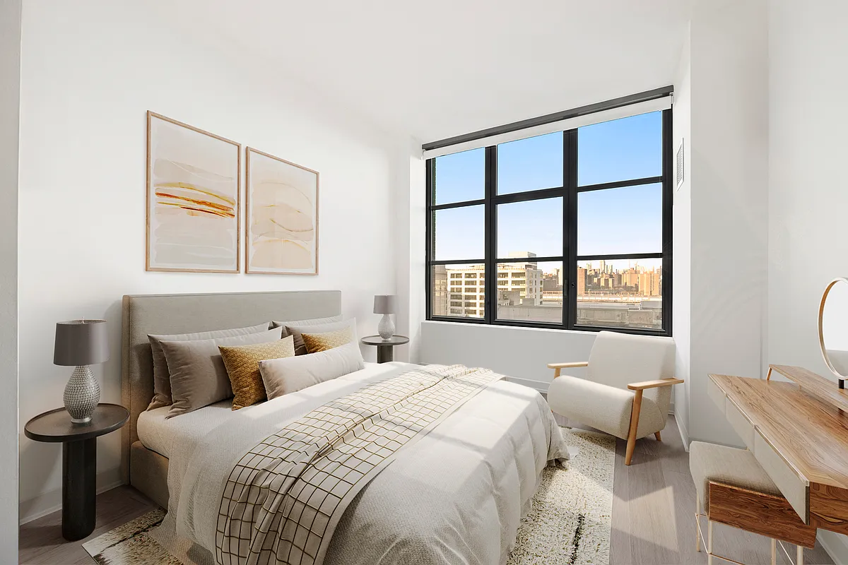 180 Front Street, Unit 9A Brooklyn, NY 11201 - Photo 8 of 25 a bedroom with a bed and a large window