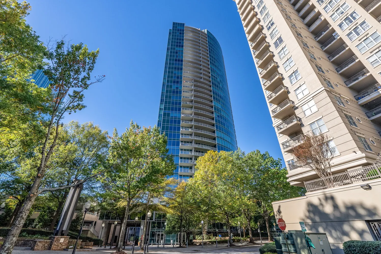 a kitchen with granite countertop a sink and a stove top oven