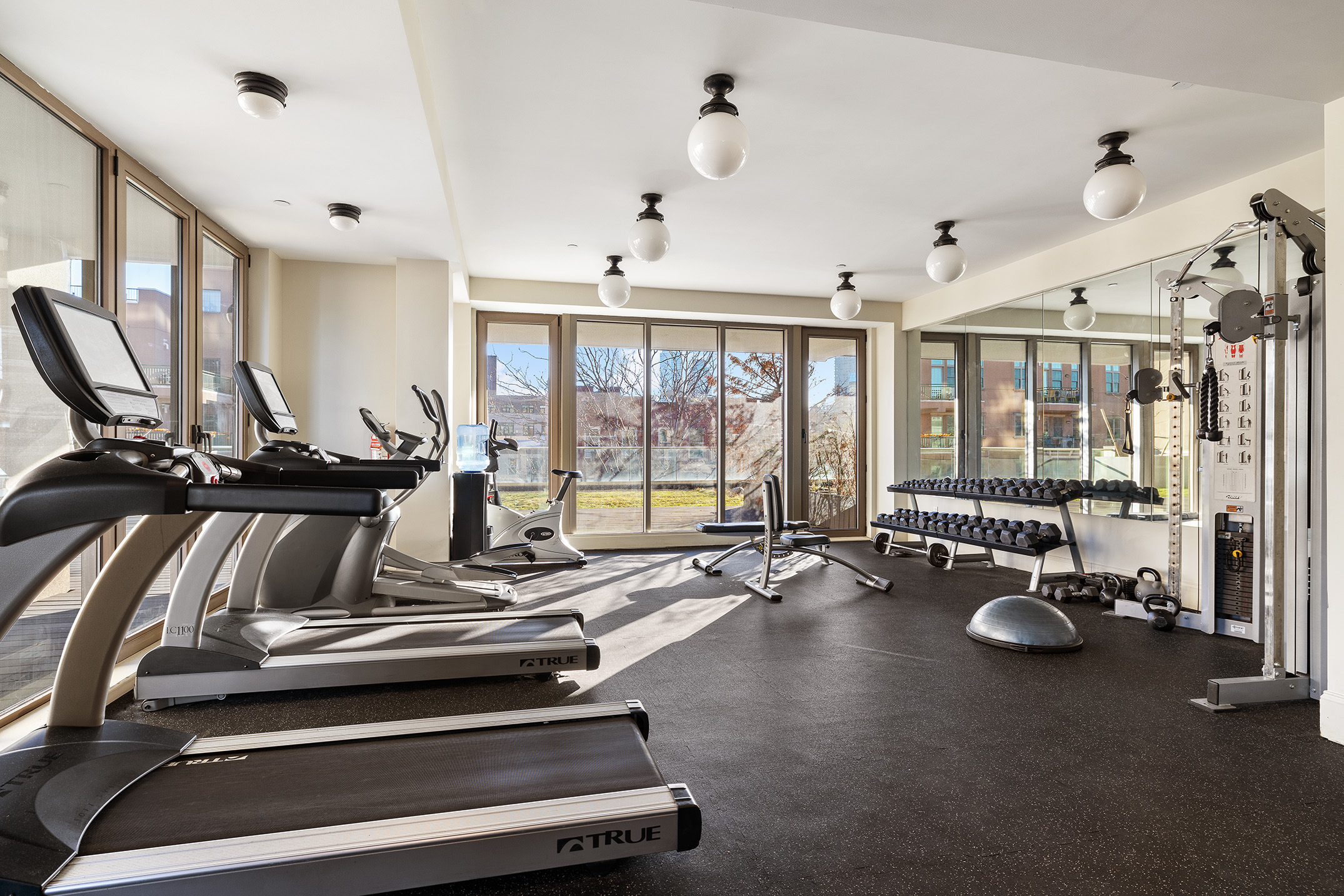 144 North 8th Street, Unit 12B Brooklyn, NY 11249 - Photo 14 of 15 a view of a room with gym equipment