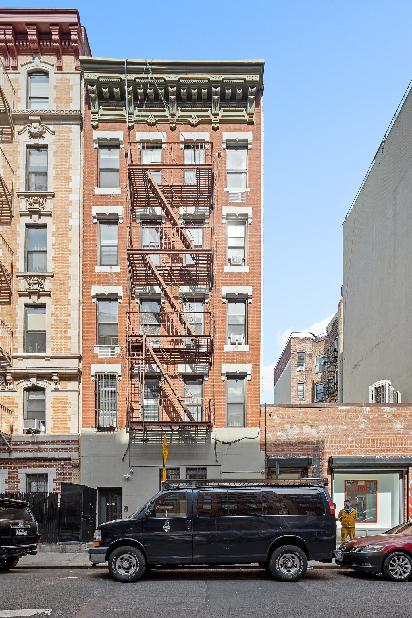 186 East 2nd Street, Unit 16 Manhattan, NY 10009 - Photo 16 of 17 a car parked in front of a building