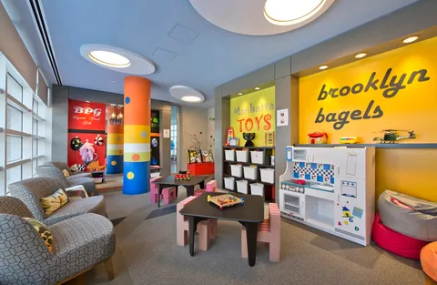 a outdoor living space with furniture and a flat screen tv