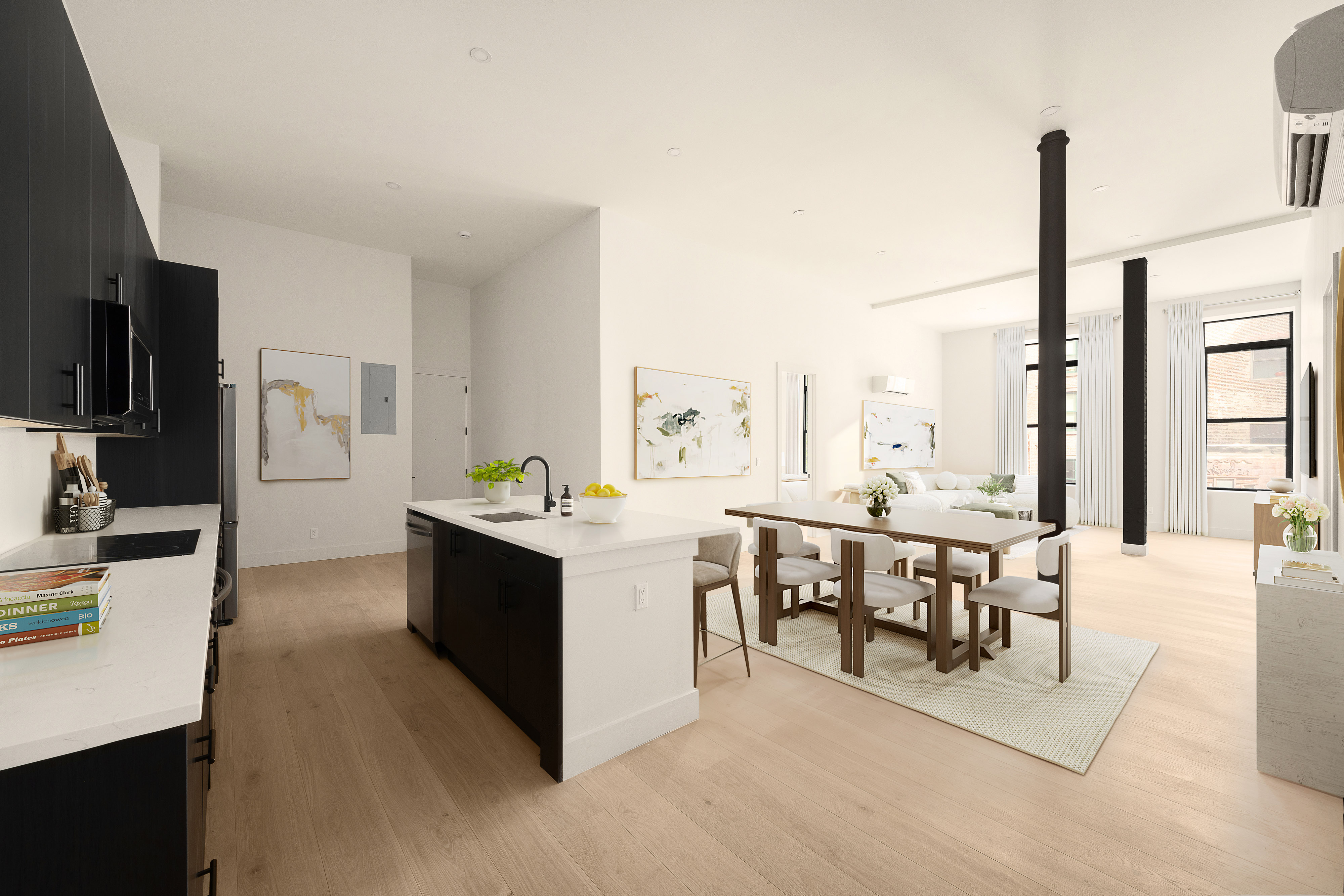 a large living room with stainless steel appliances kitchen island granite countertop furniture and a kitchen view