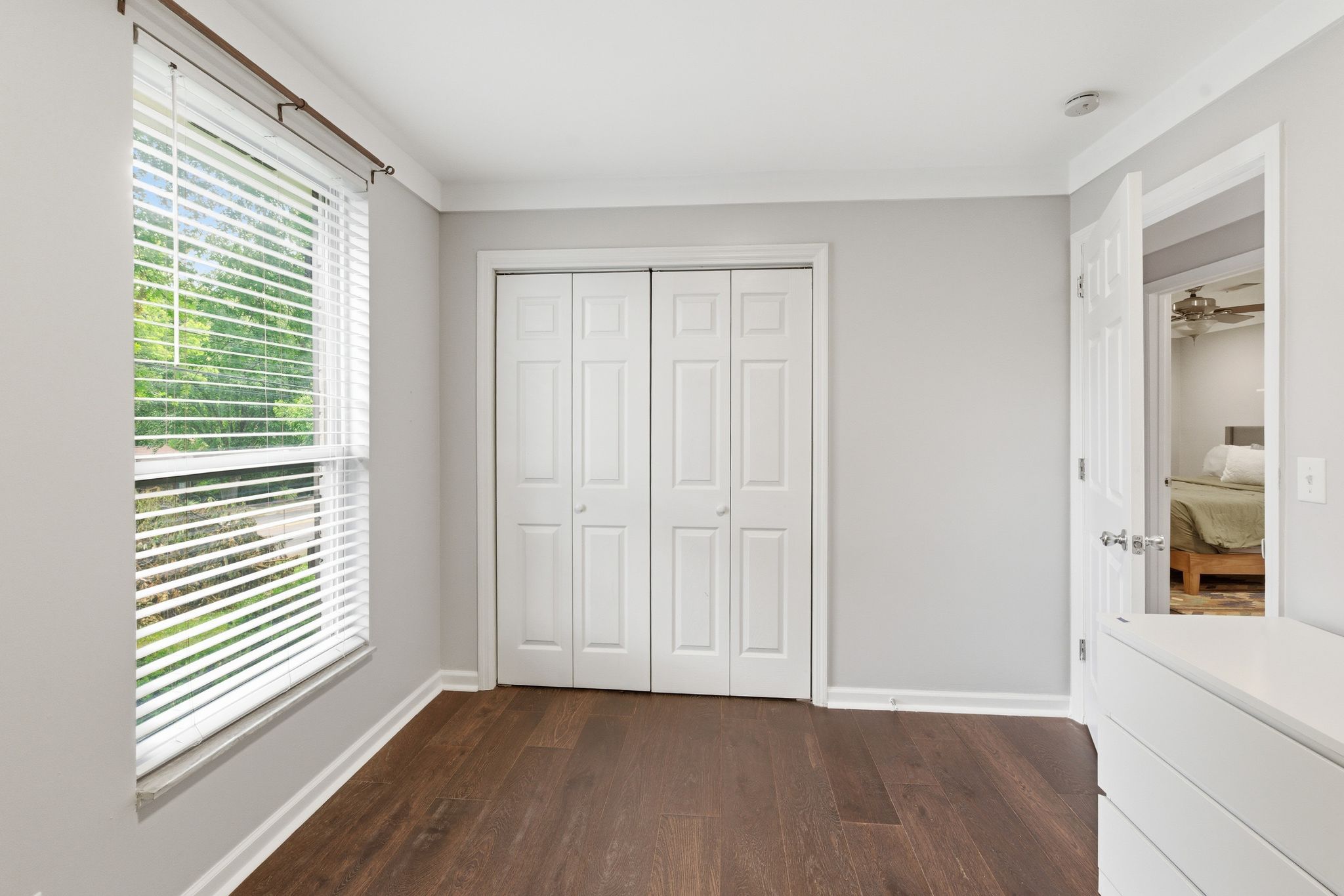 307 Paragon Mills Road Nashville, TN 37211 - Photo 20 of 29 wooden floor in an empty room with a window