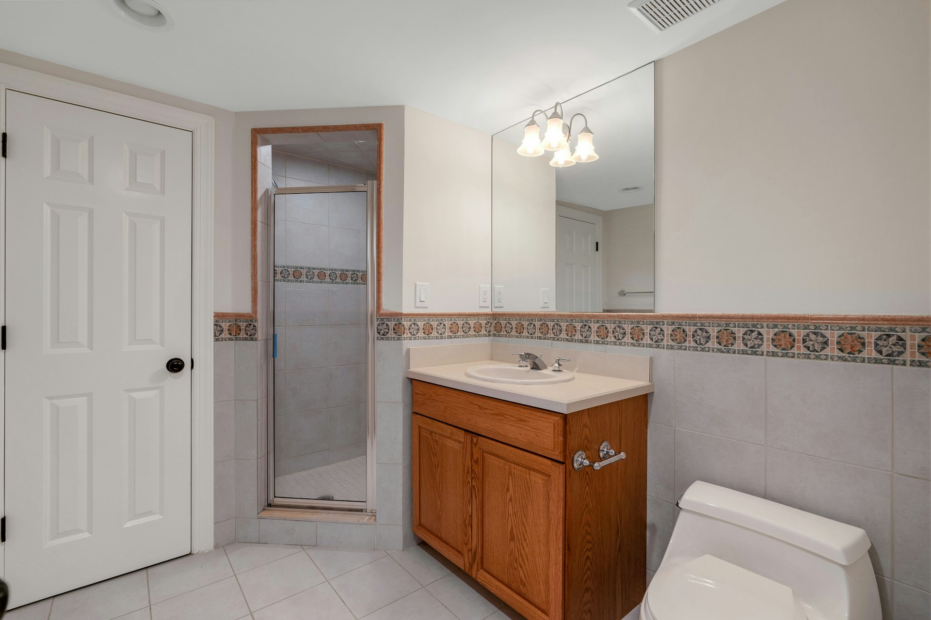 3 Kensington Court Warren, NJ 07059 - Photo 55 of 66 a bathroom with a sink a toilet and mirror