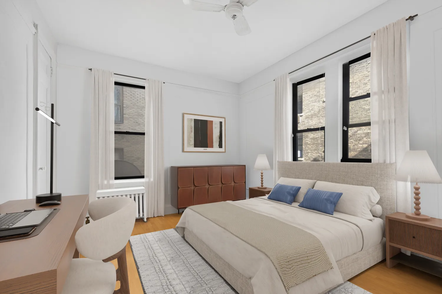 a bedroom with a bed and a large mirror