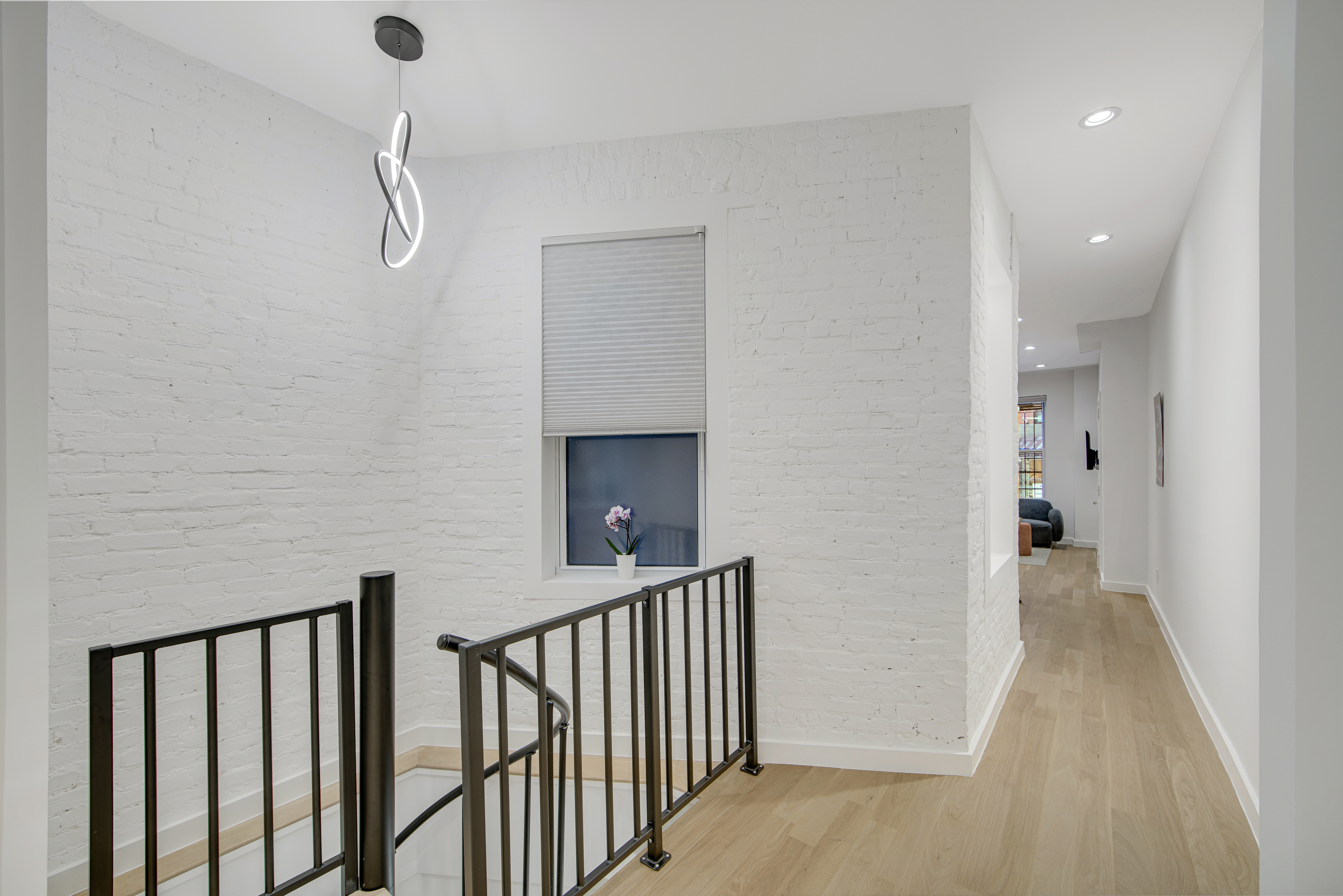214 West 16th Street, Unit 1W Manhattan, NY 10011 - Photo 7 of 13 a view of hallway with stairs