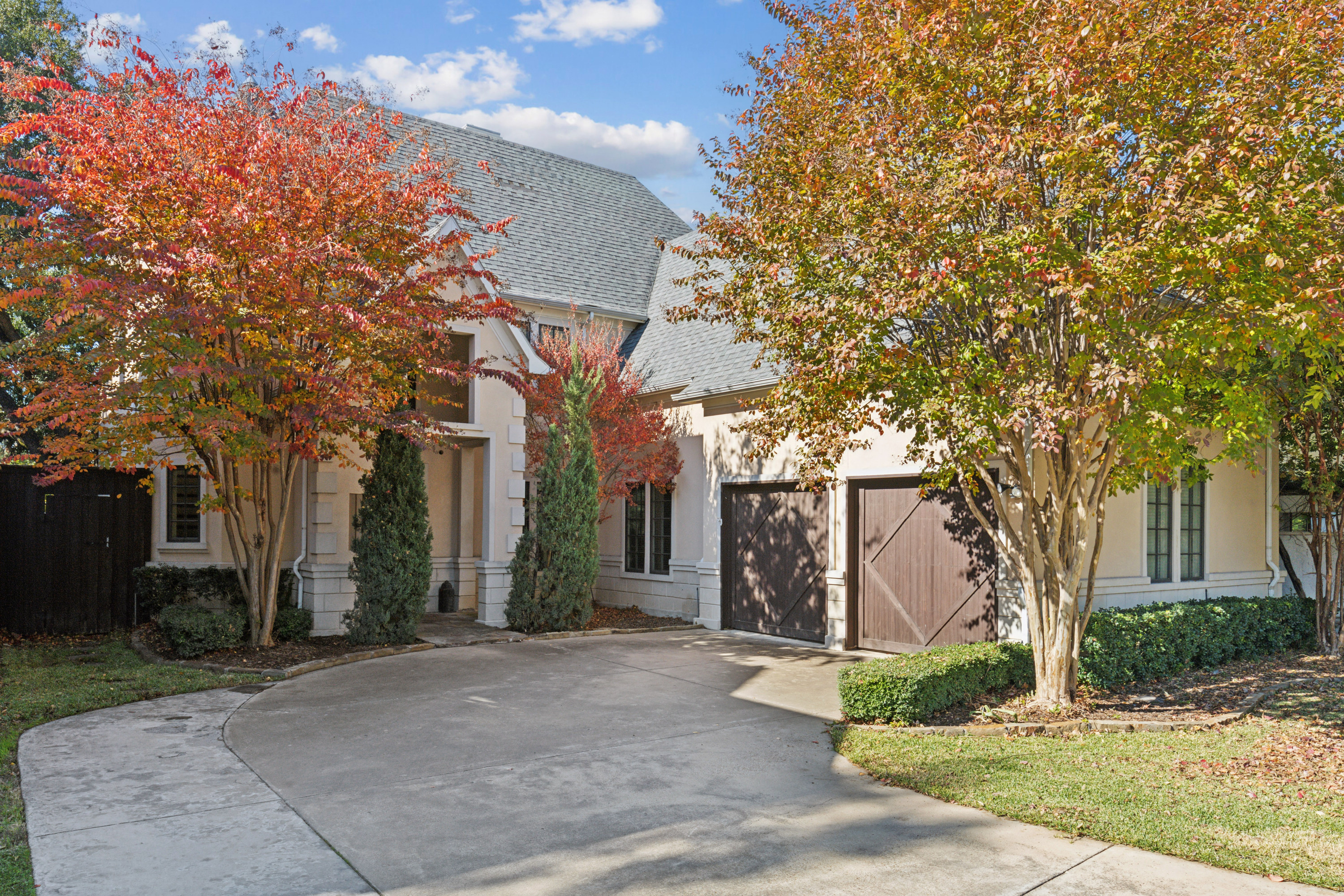 8411 Midway Road Dallas, TX 75209 - Photo 1 of 29 a view of road with large trees