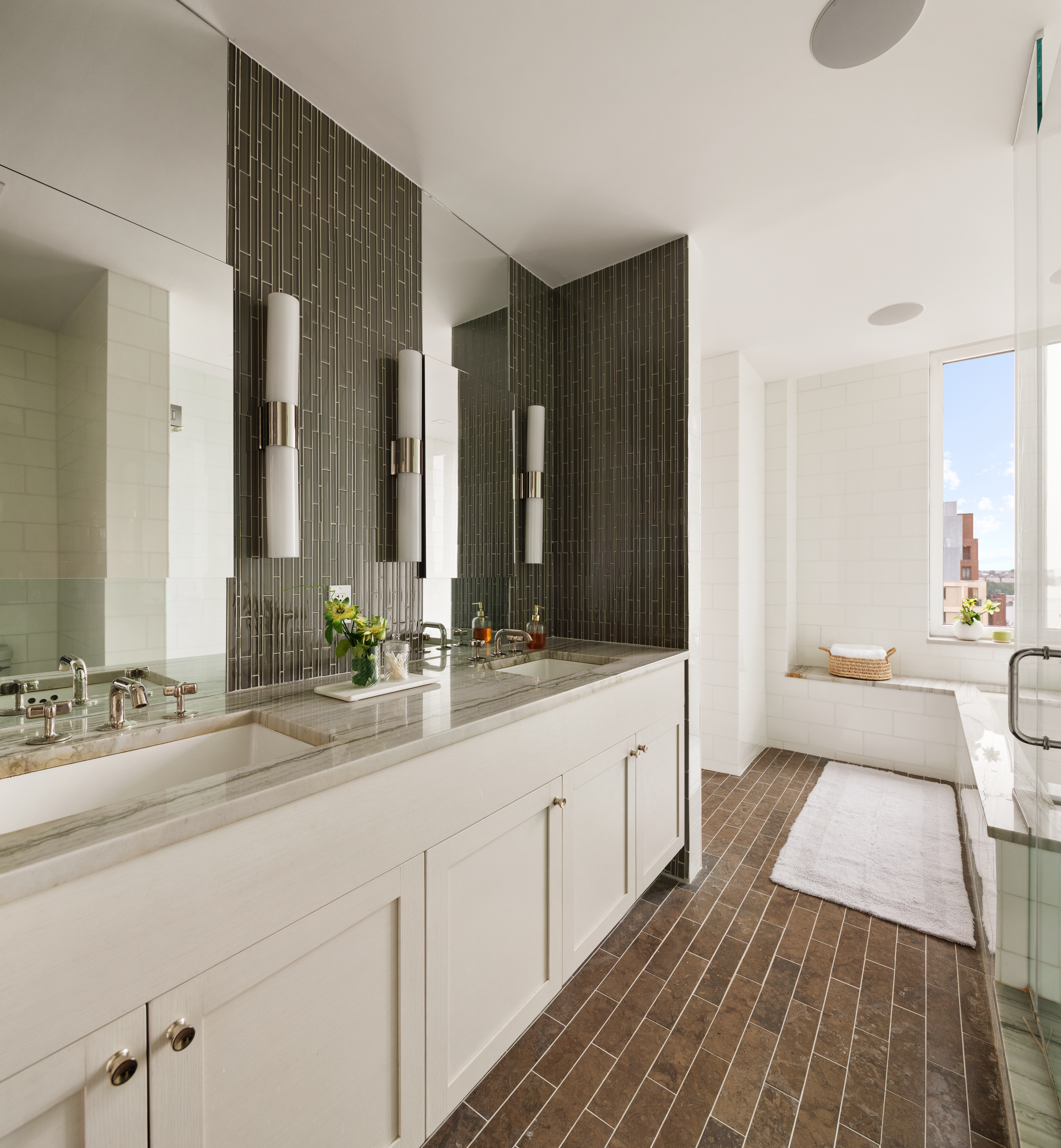 230 West 78th Street, Unit PH19 Manhattan, NY 10024 - Photo 11 of 17 a spacious bathroom with a double vanity sink and mirror