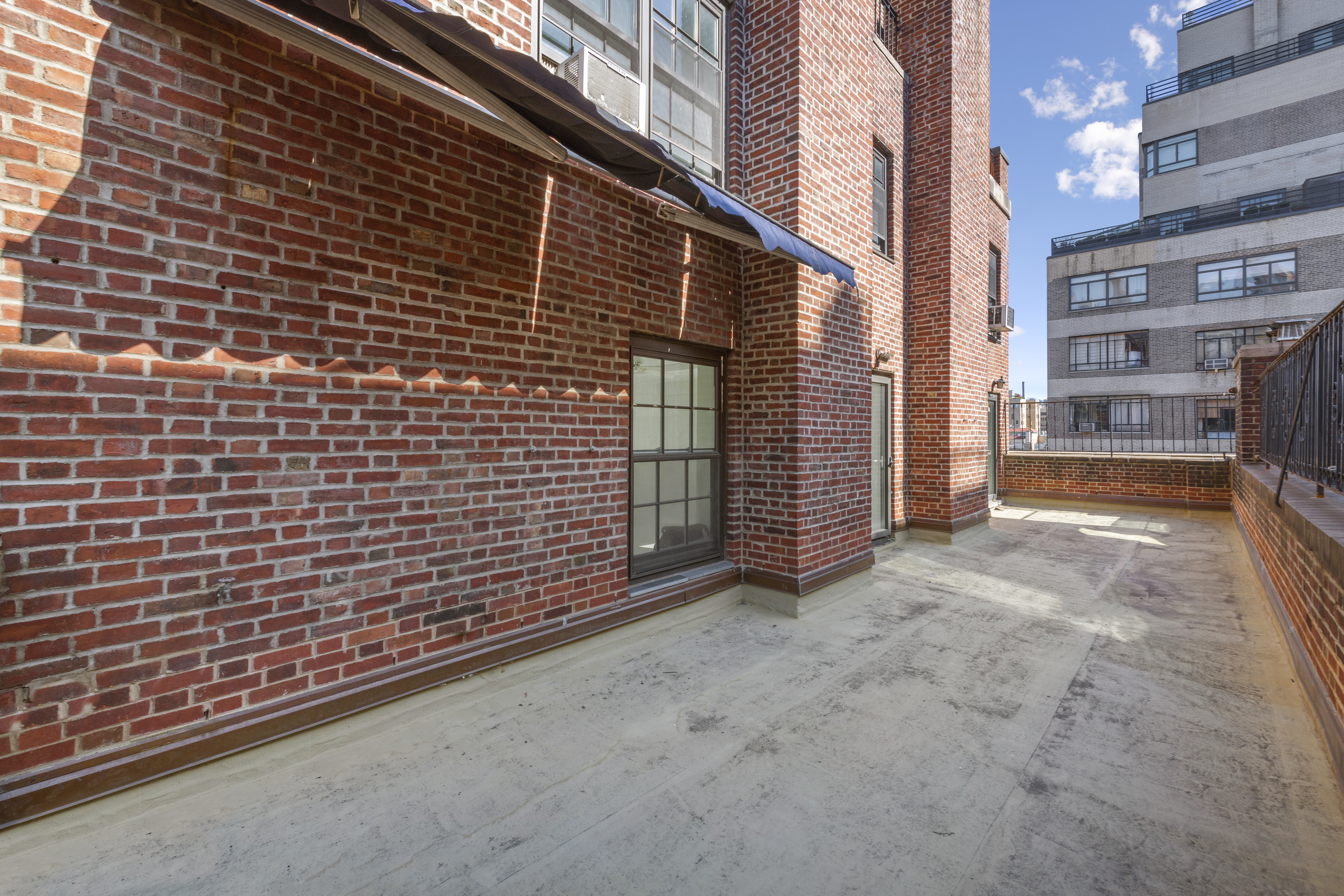 12 East 88th Street, Unit PH11/12B Manhattan, NY 10128 - Photo 17 of 22 a view of a brick building