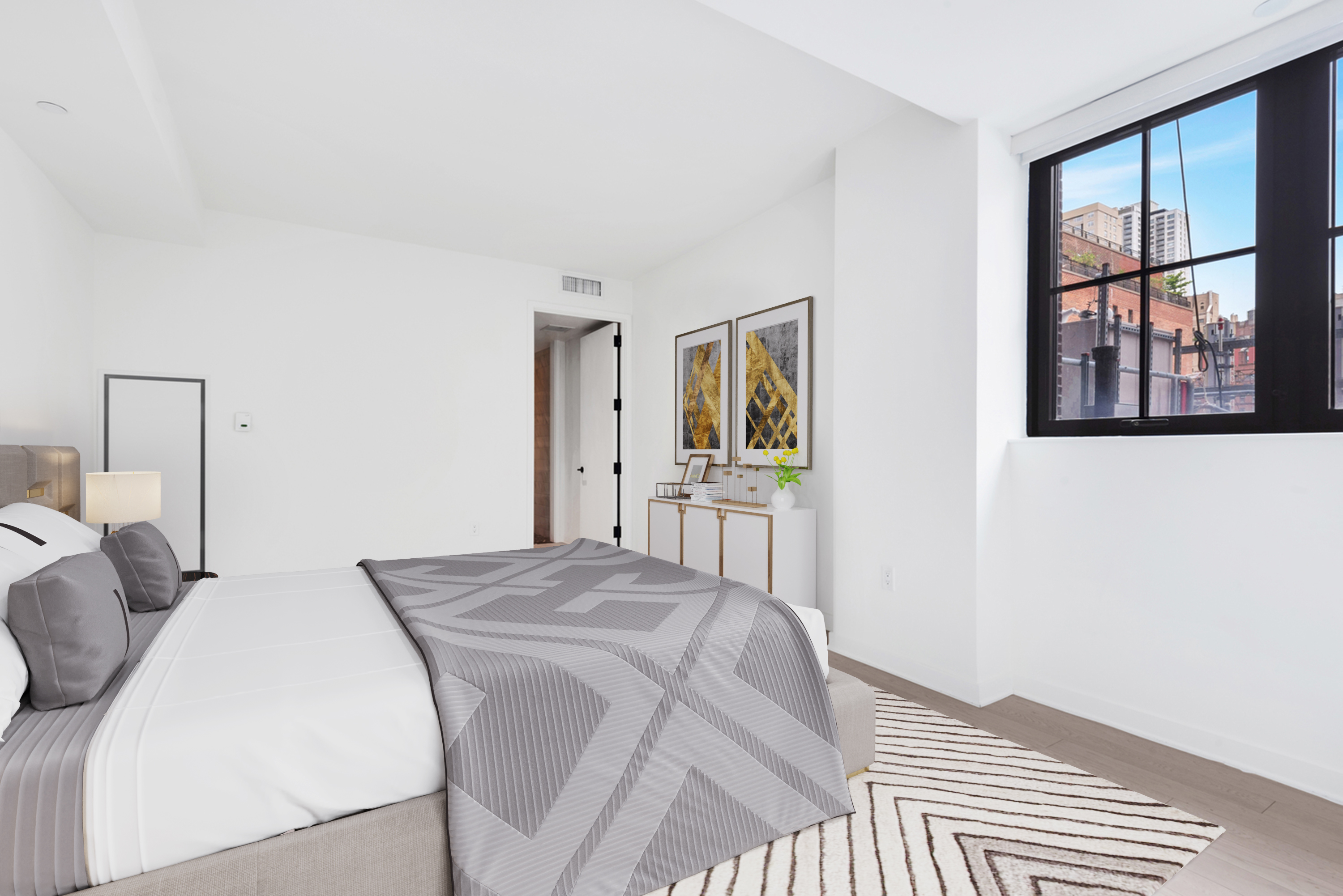 959 1st Avenue, Unit 6P Manhattan, NY 10022 - Photo 5 of 12 a bedroom with a bed and a window