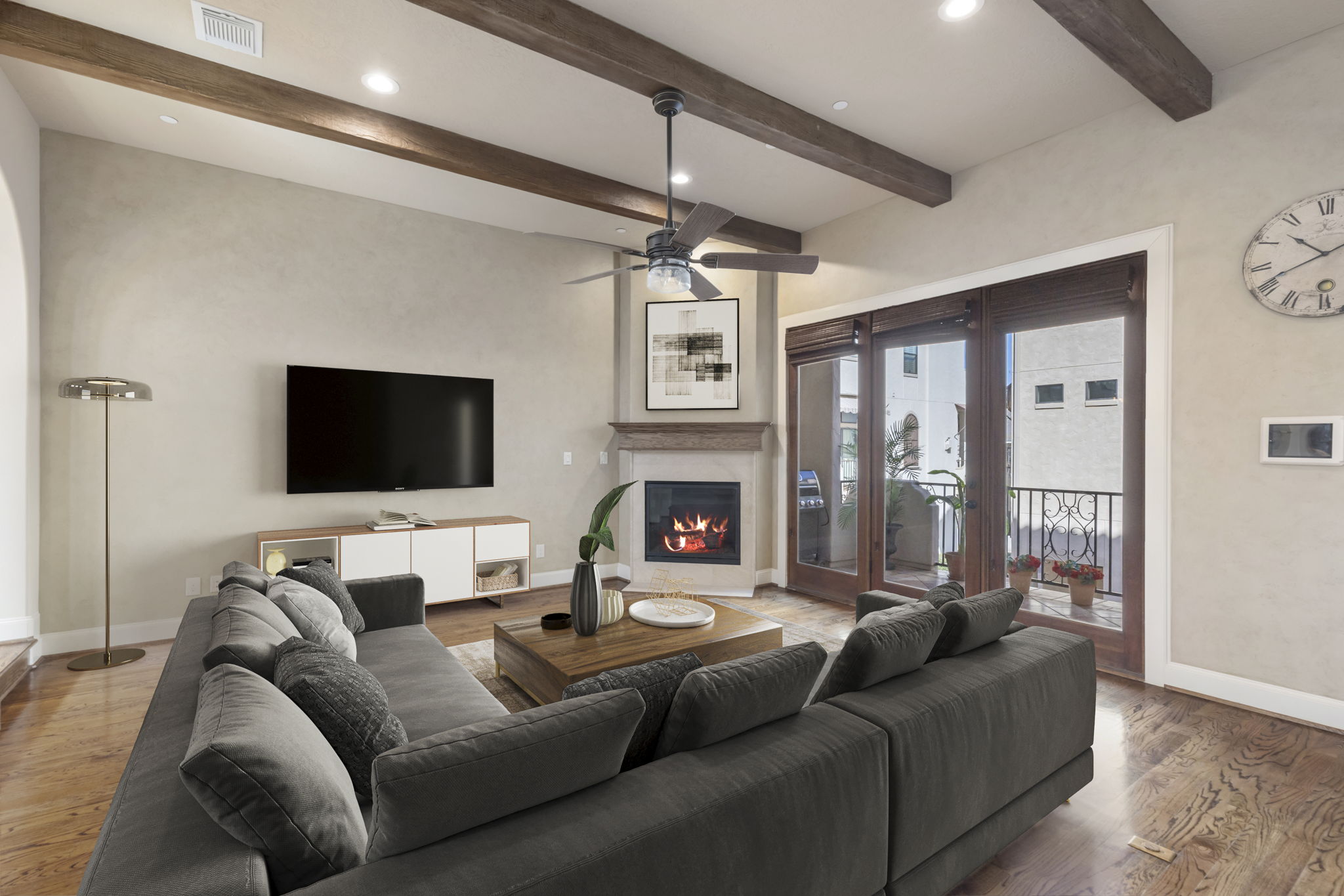 5407 Feagan Street Houston, TX 77007 - Photo 6 of 43 a living room with furniture a flat screen tv and a fireplace