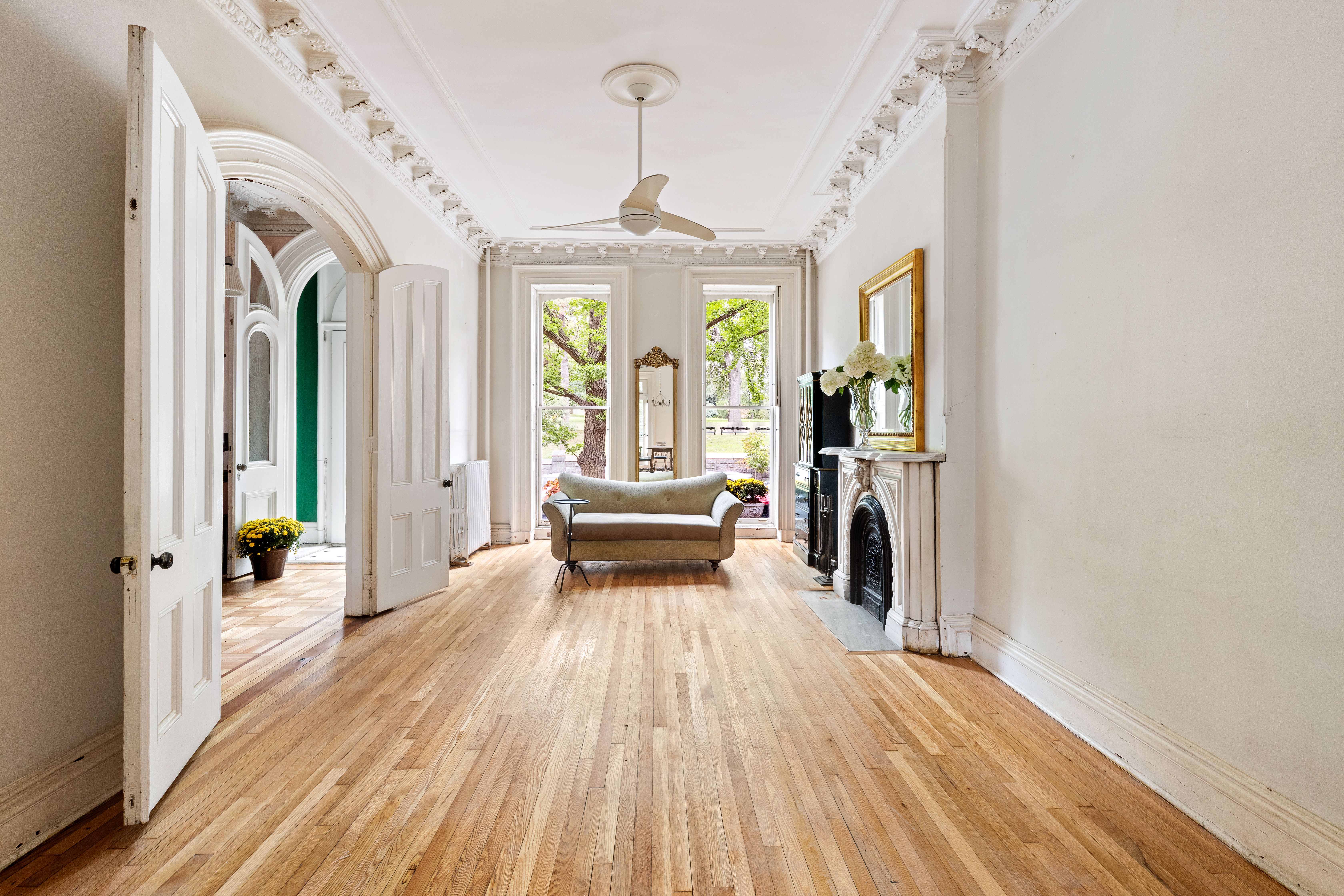 152 Dekalb Avenue Brooklyn, NY 11217 - Photo 4 of 27 a view of a room with wooden floor staircase and a living room