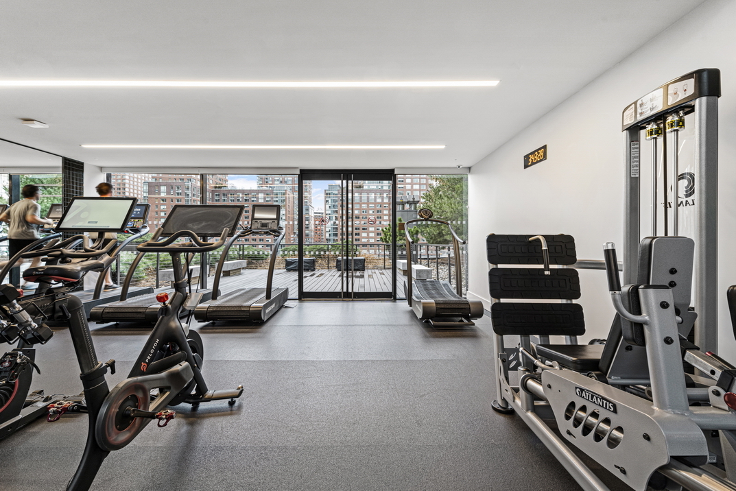 101 Warren Street, Unit 11L Manhattan, NY 10007 - Photo 24 of 26 a view of a room with gym equipment