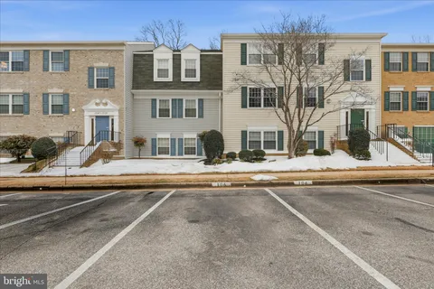 a view of house with yard