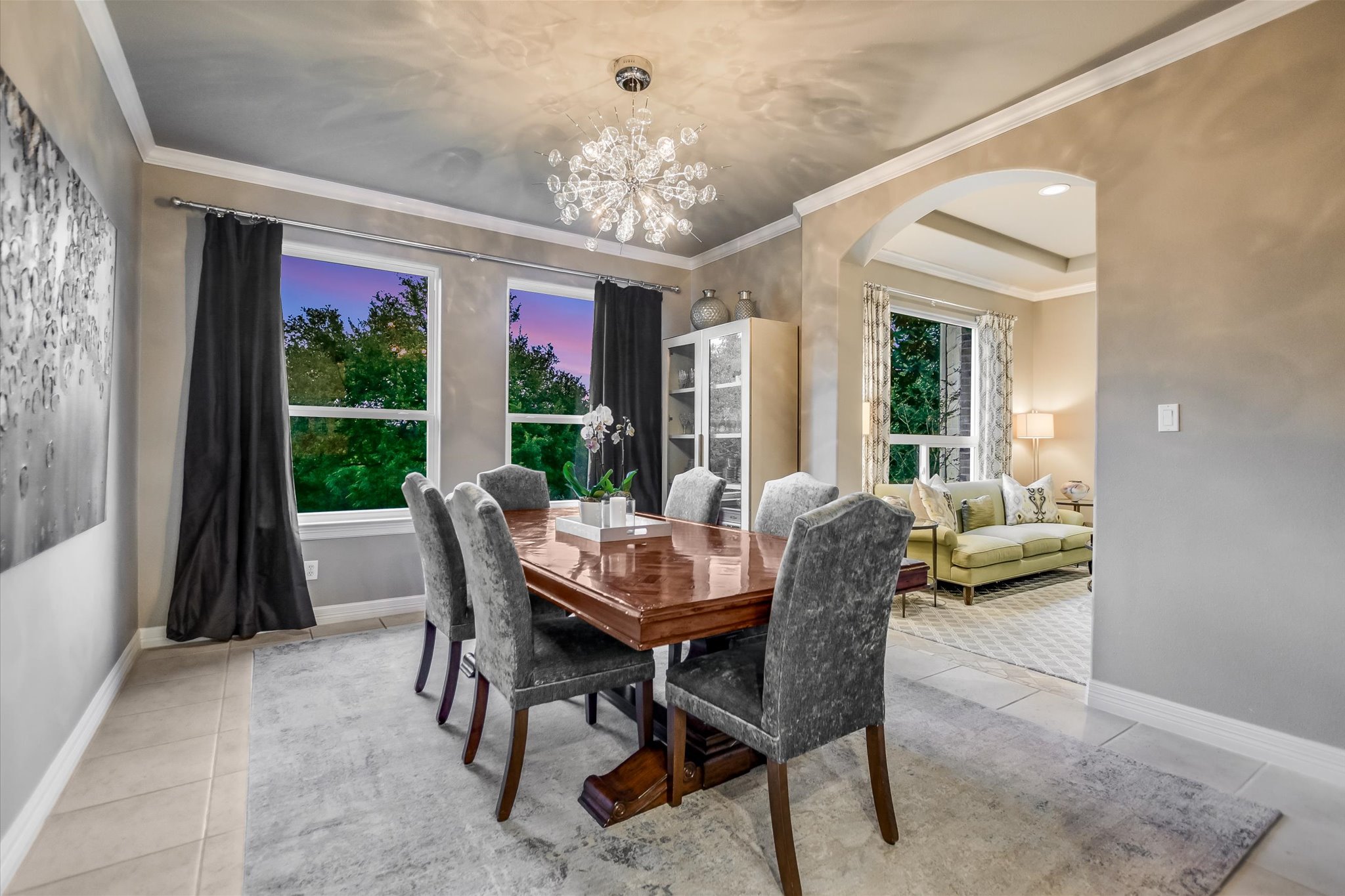 1422 Palomino Ridge Drive Austin, TX 78733 - Photo 7 of 60 a view of a dining room with furniture wooden floor and chandelier